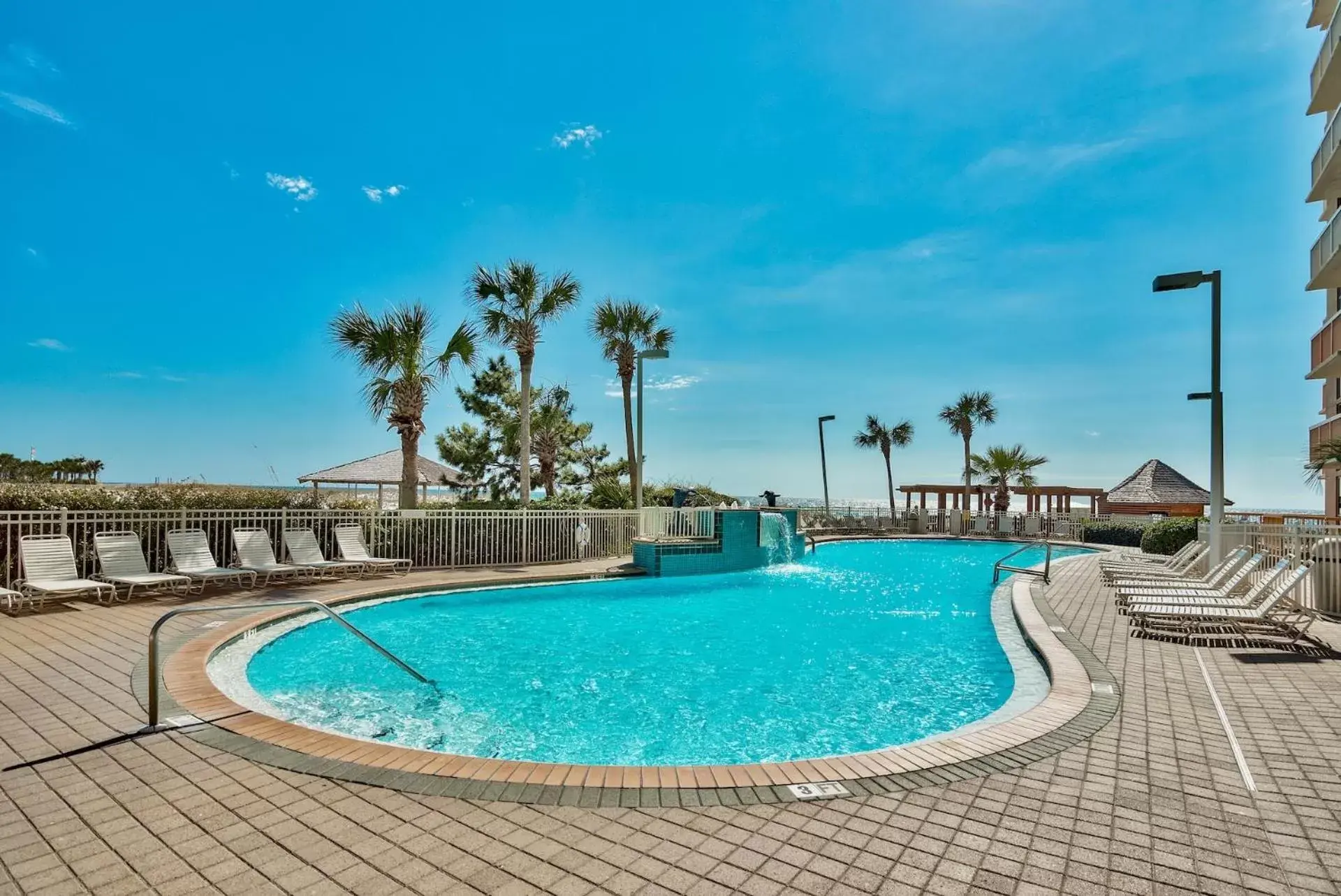 Property building, Swimming Pool in Pelican Beach Resort by Tufan