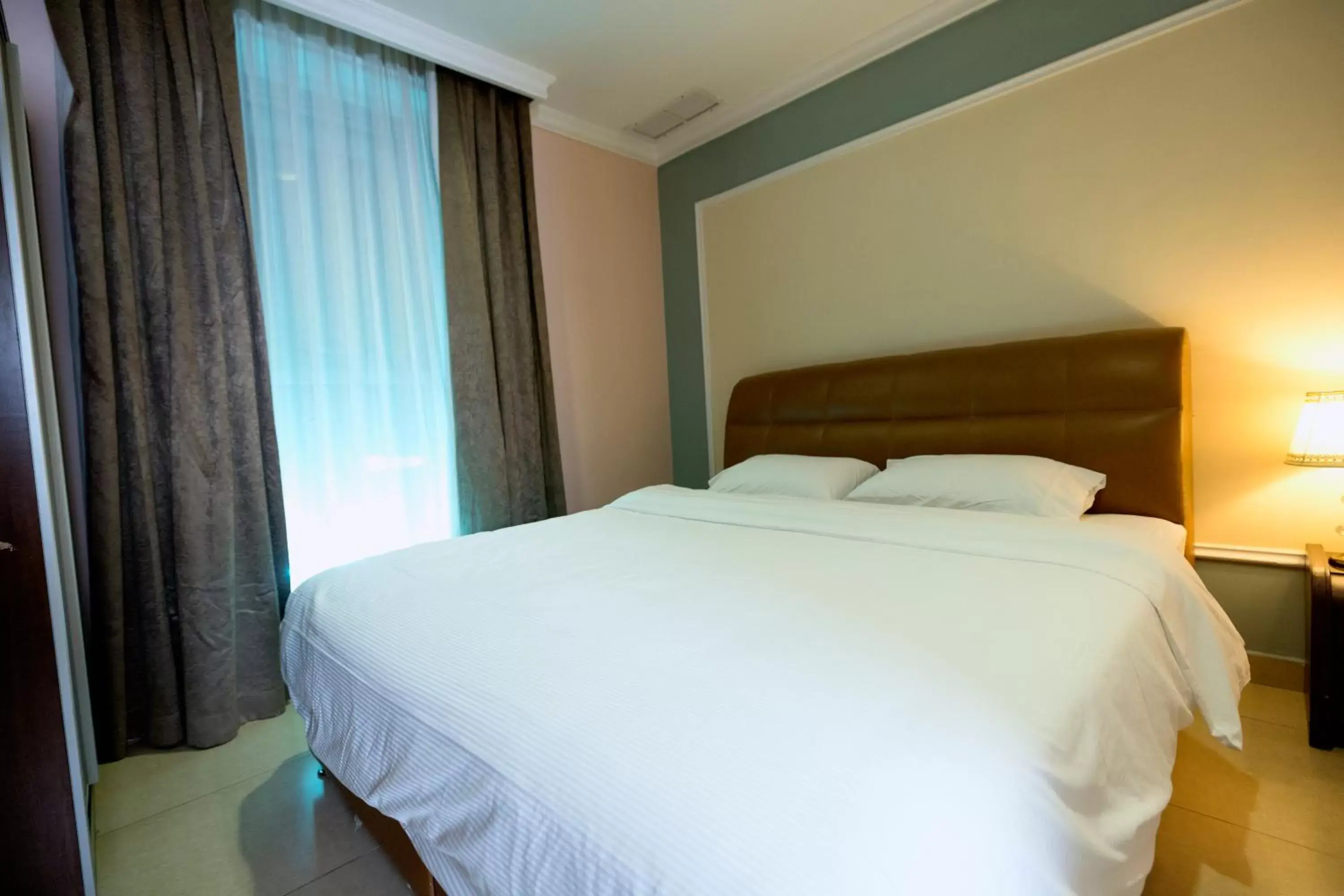 Bed in Laguna Hotel Suites Bed in Laguna Hotel Suites