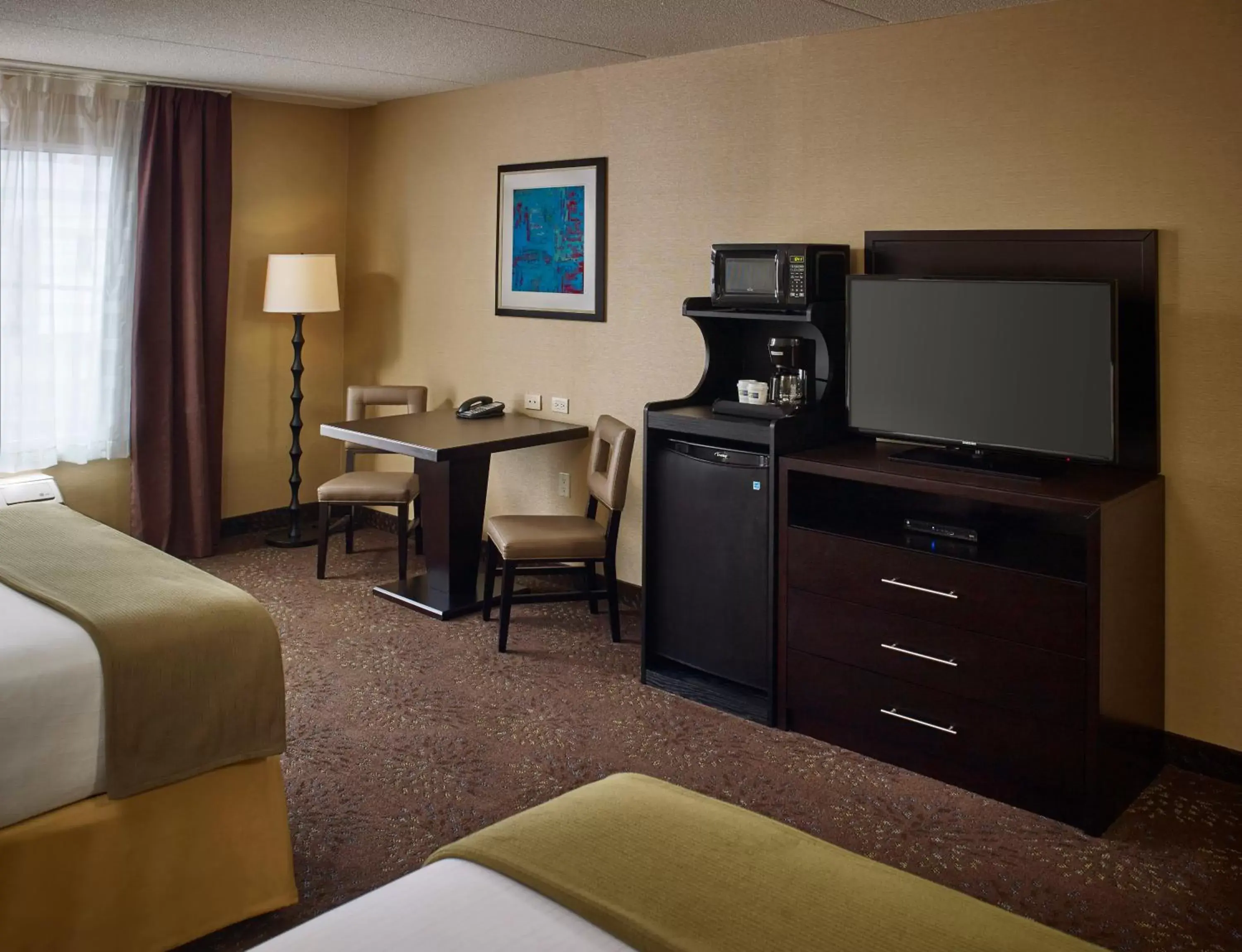 Photo of the whole room, TV/Entertainment Center in Holiday Inn Express and Suites Timmins, an IHG Hotel