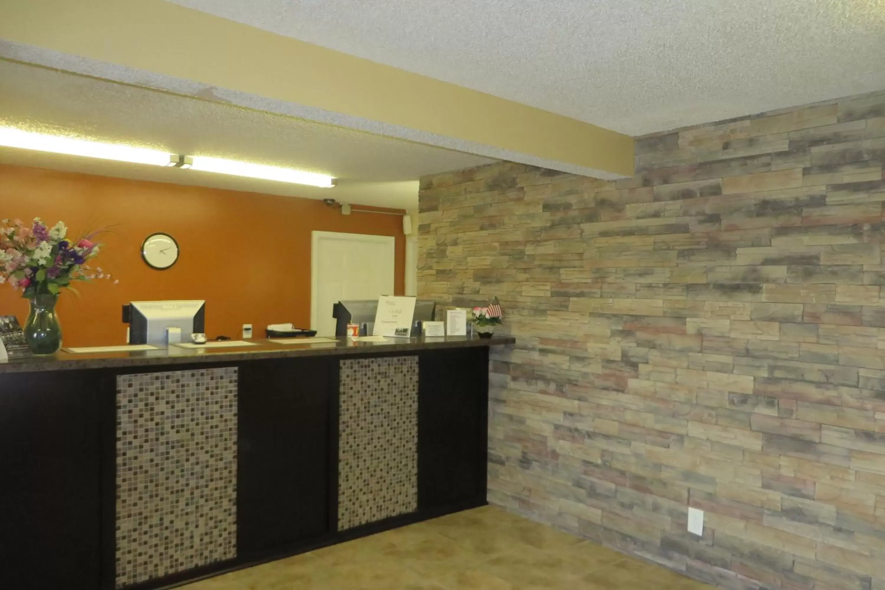 Lobby or reception in Super 8 by Wyndham Grinnell IA Lobby or reception in Super 8 by Wyndham Grinnell IA