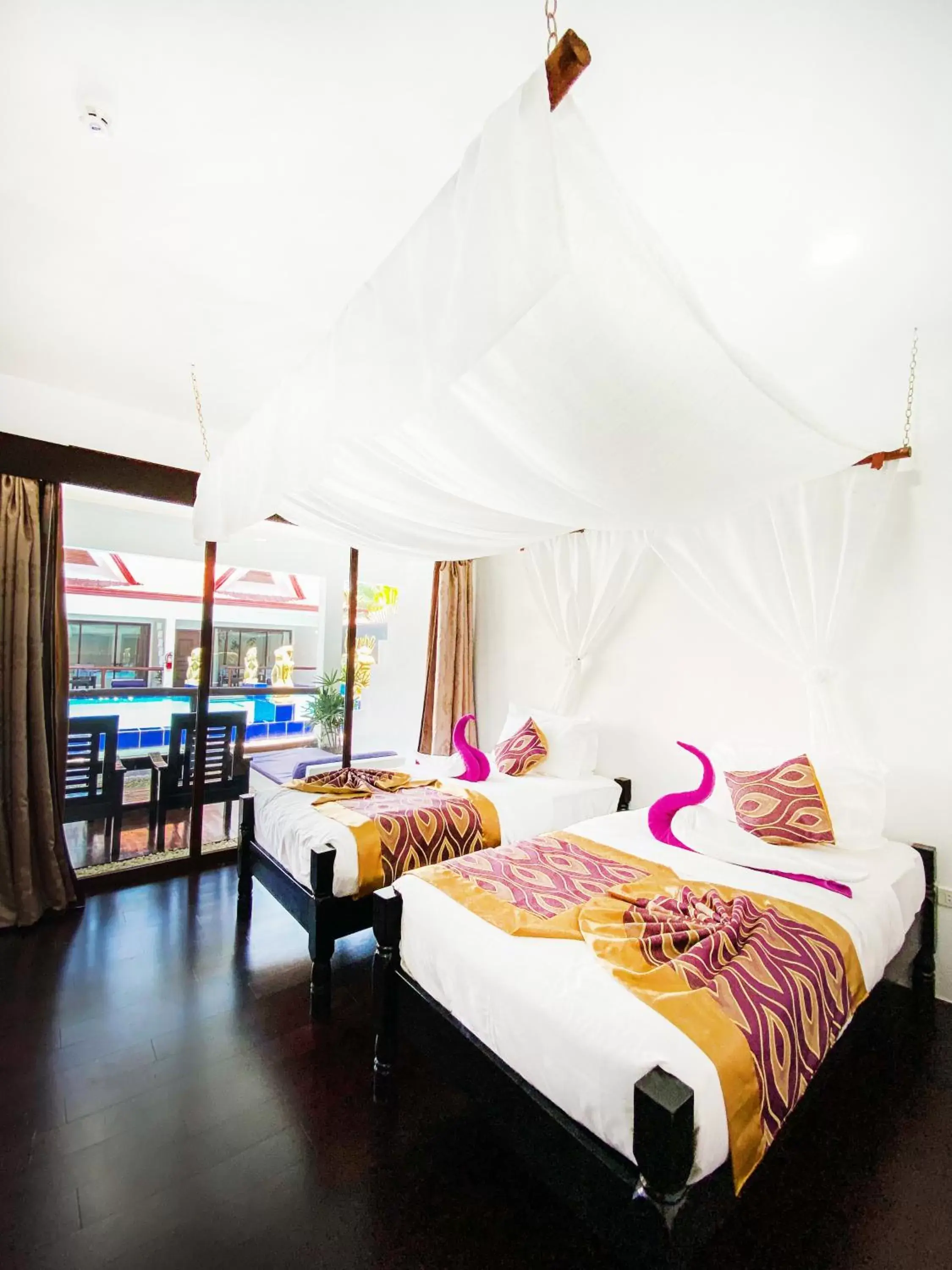 Bedroom, Bed in Carpe Diem Villas & Resort Dive & Stay resort Bedroom, Bed in Carpe Diem Villas & Resort Dive & Stay resort