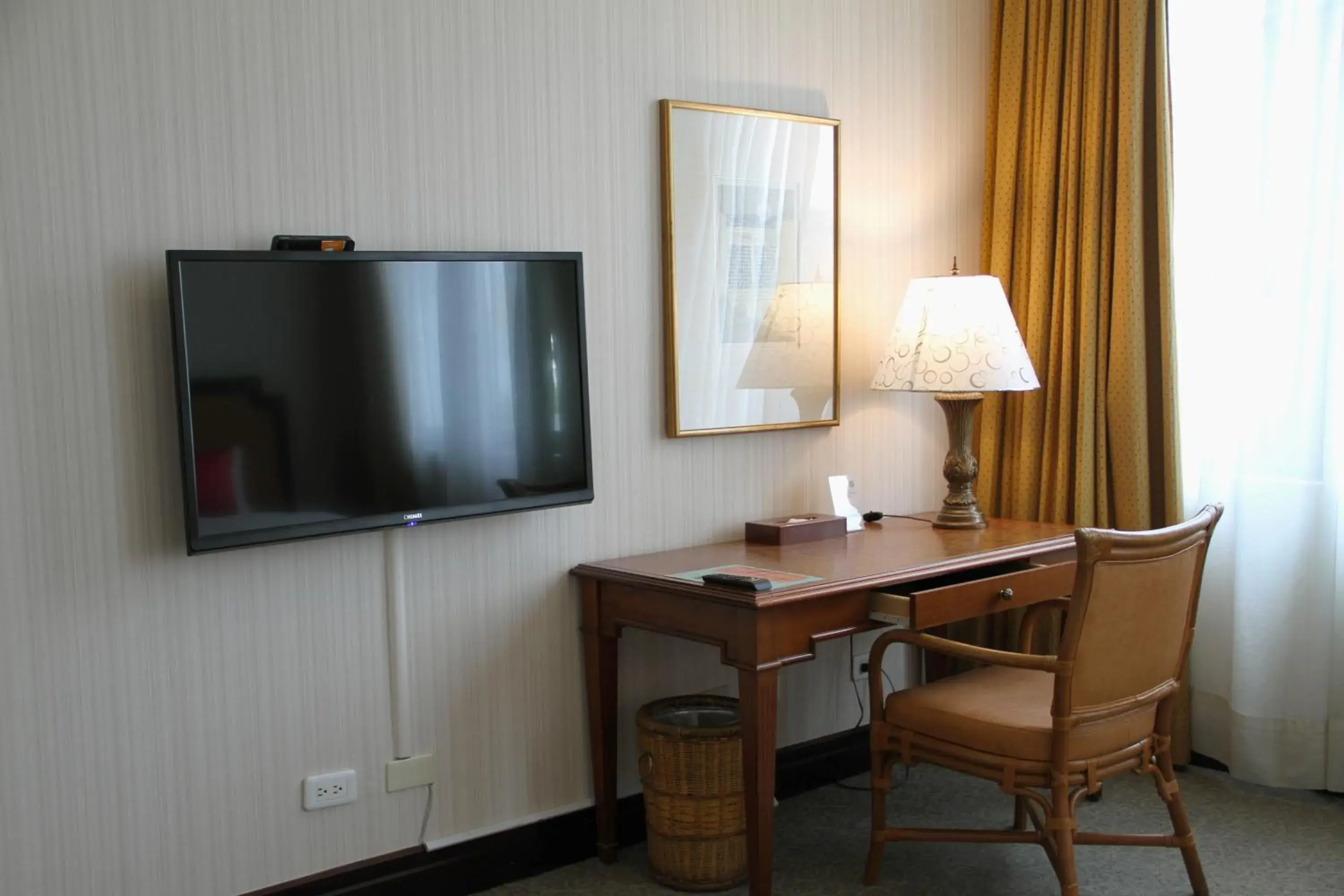 Photo of the whole room, TV/Entertainment Center in Wei-Yat Grand Hotel