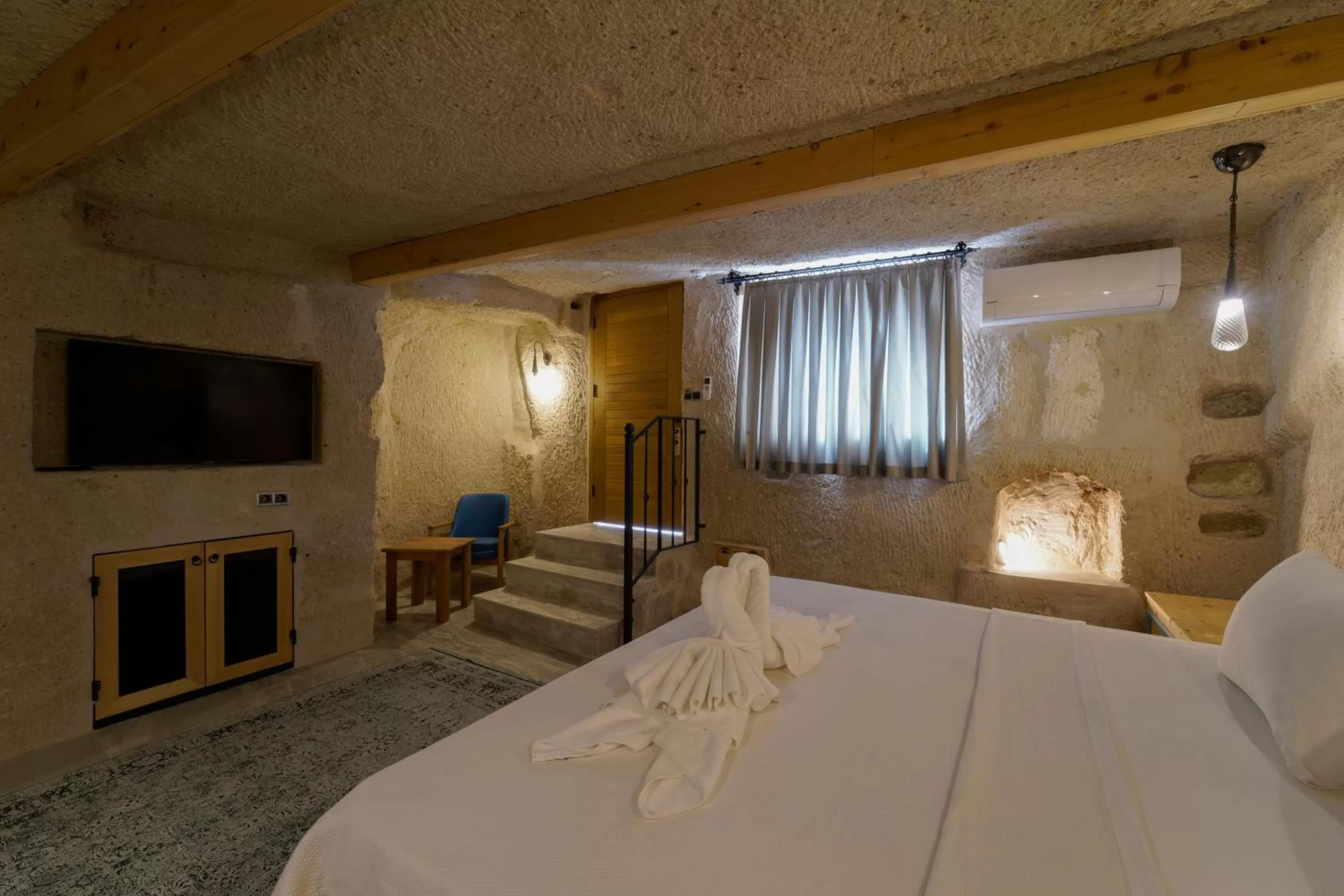 Bed in The Niche Cave Hotel