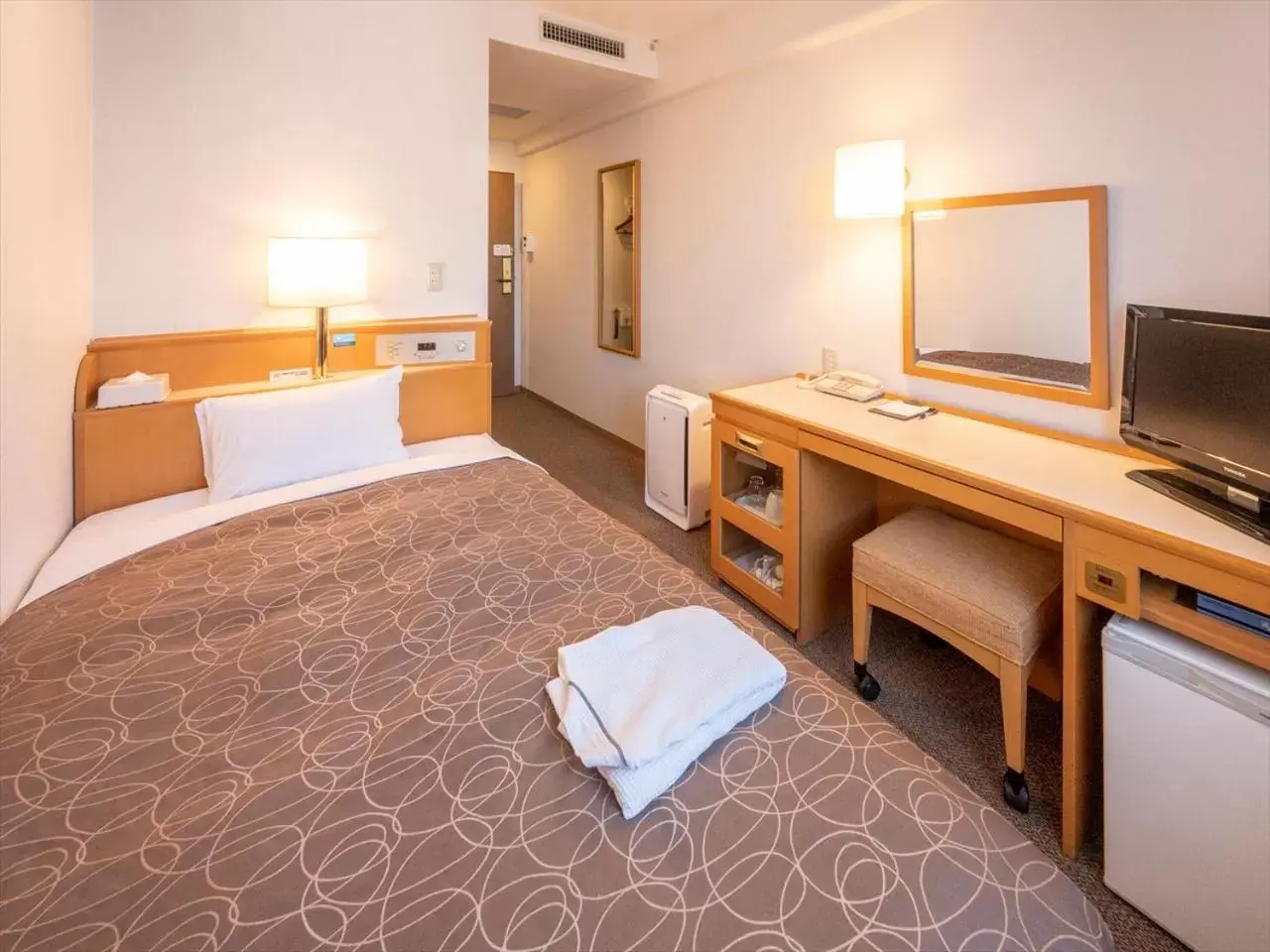 Photo of the whole room, Bed in Nishitetsu Inn Tenjin