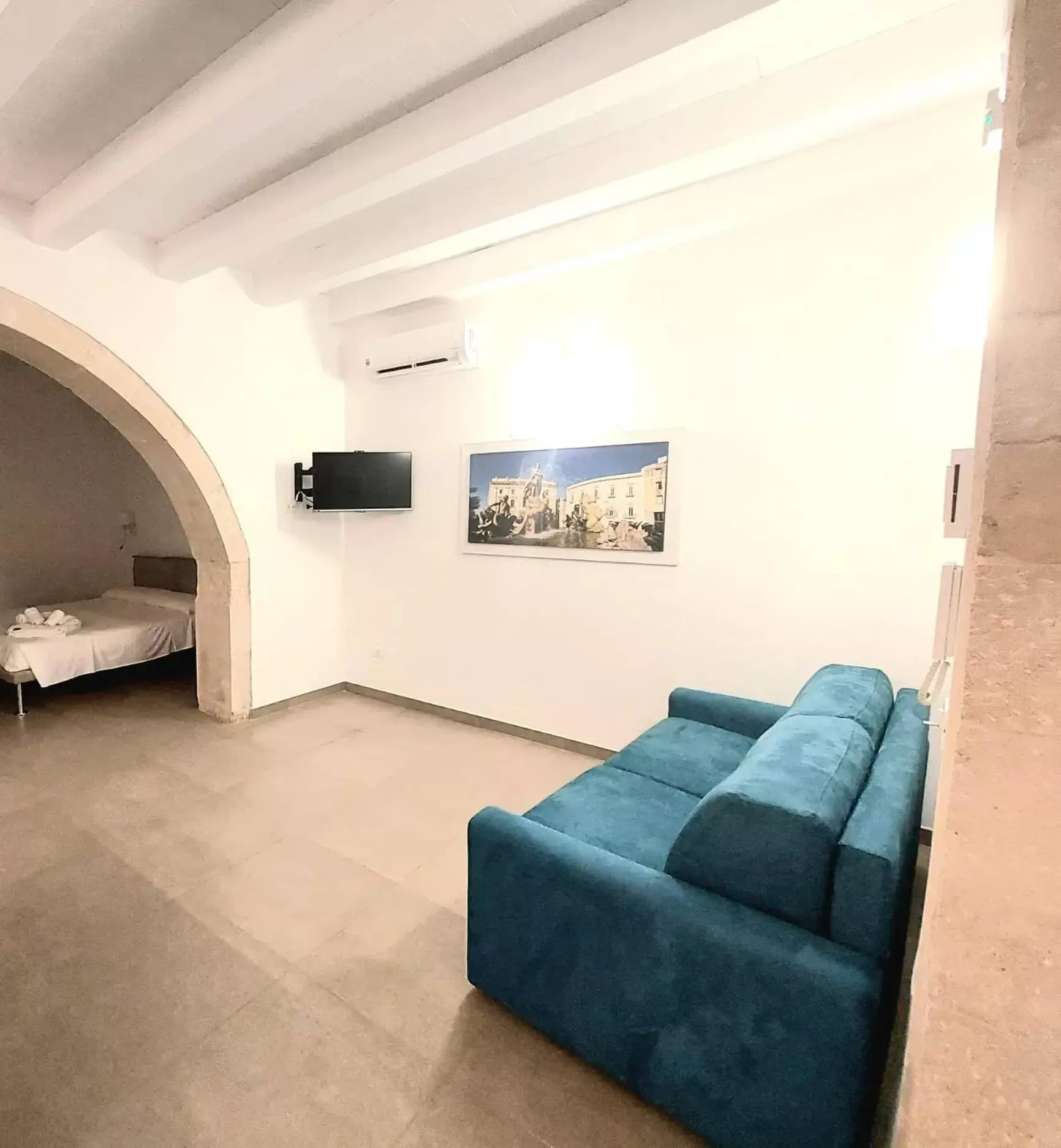 Communal lounge/ TV room, Seating Area in Corinzia Casa Vacanze