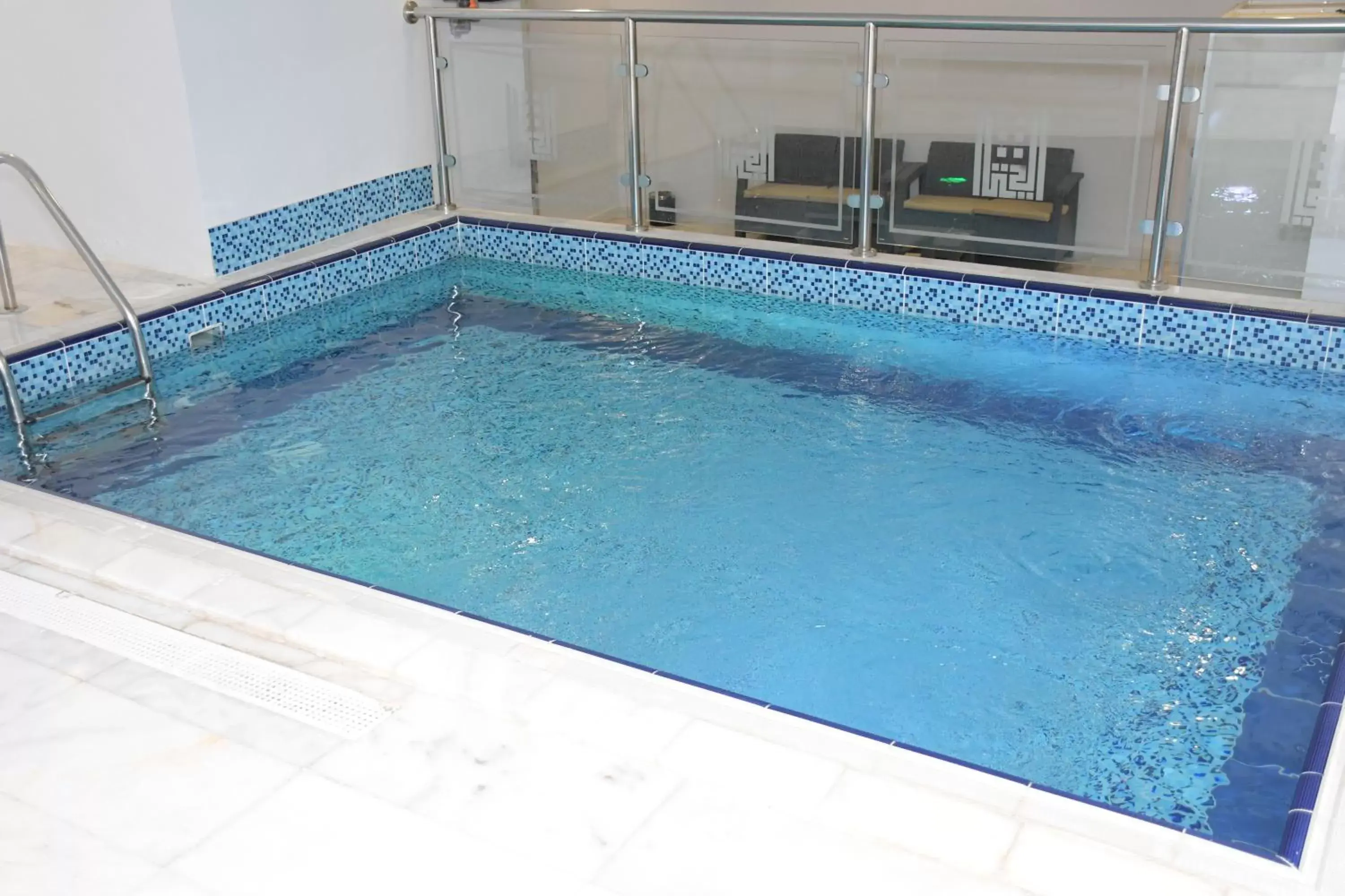 Swimming pool in شقق ارين المطار Swimming pool in شقق ارين المطار