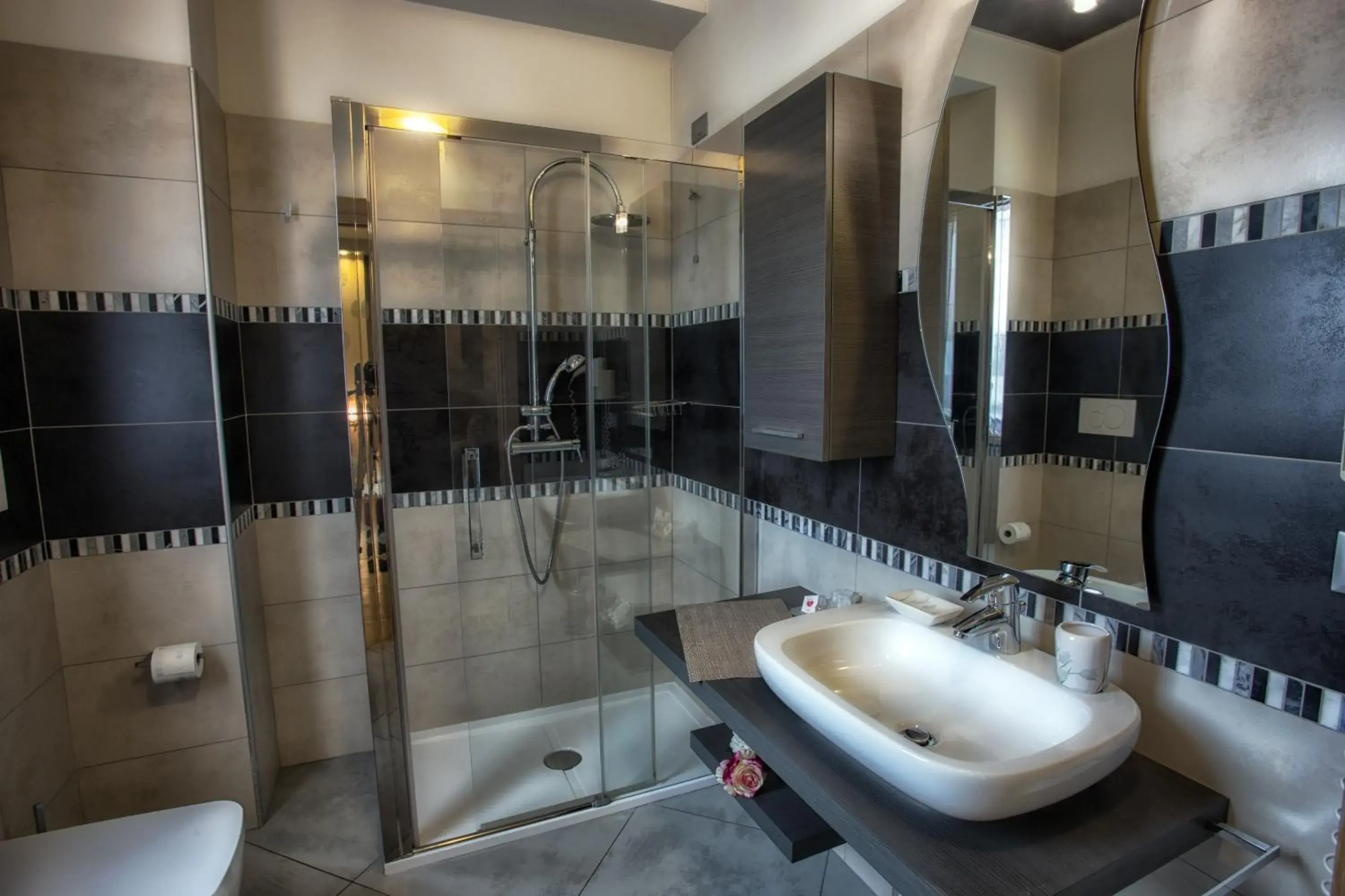 Bathroom in La Grotta Hotel