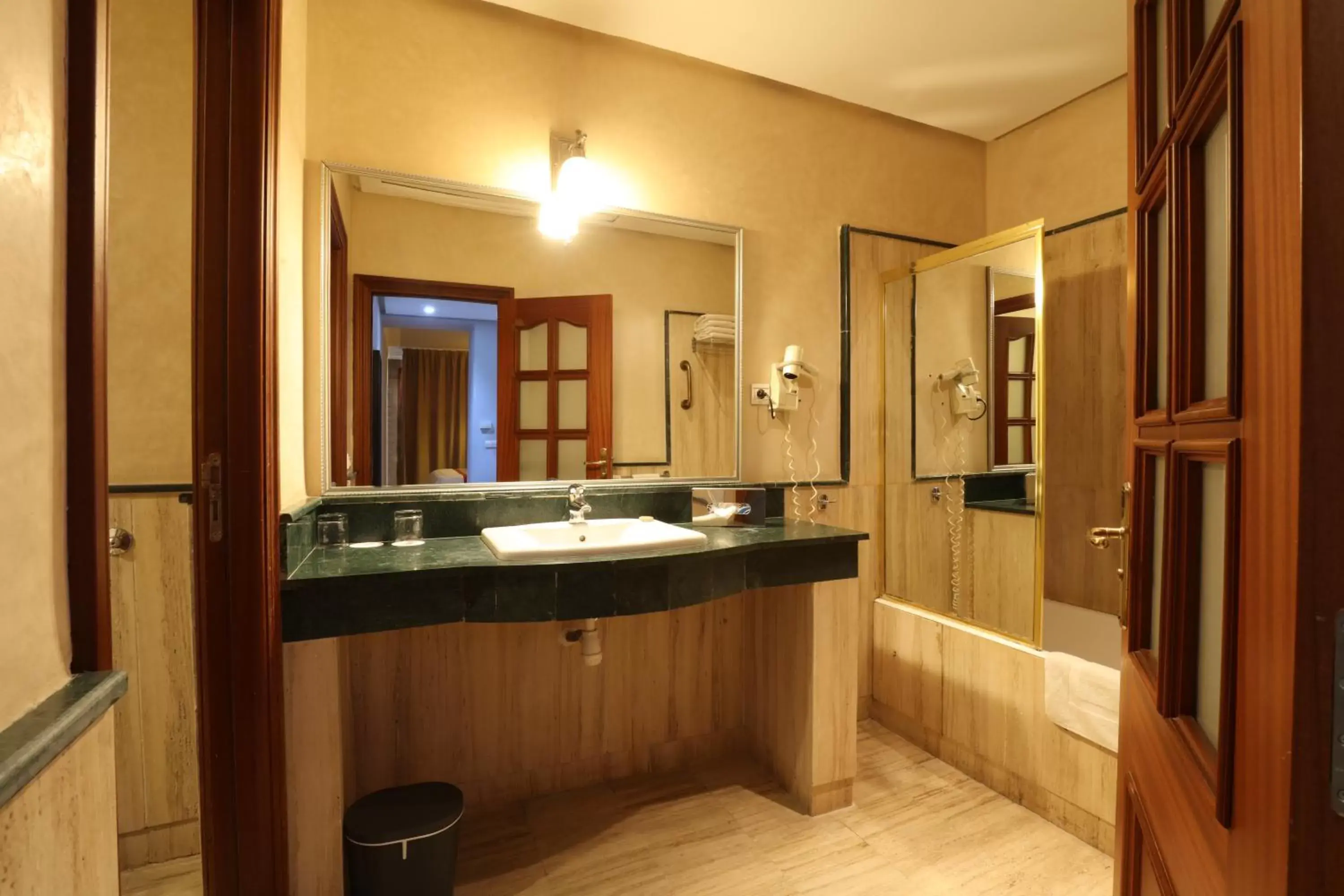 Bathroom in Hôtel Les Saisons