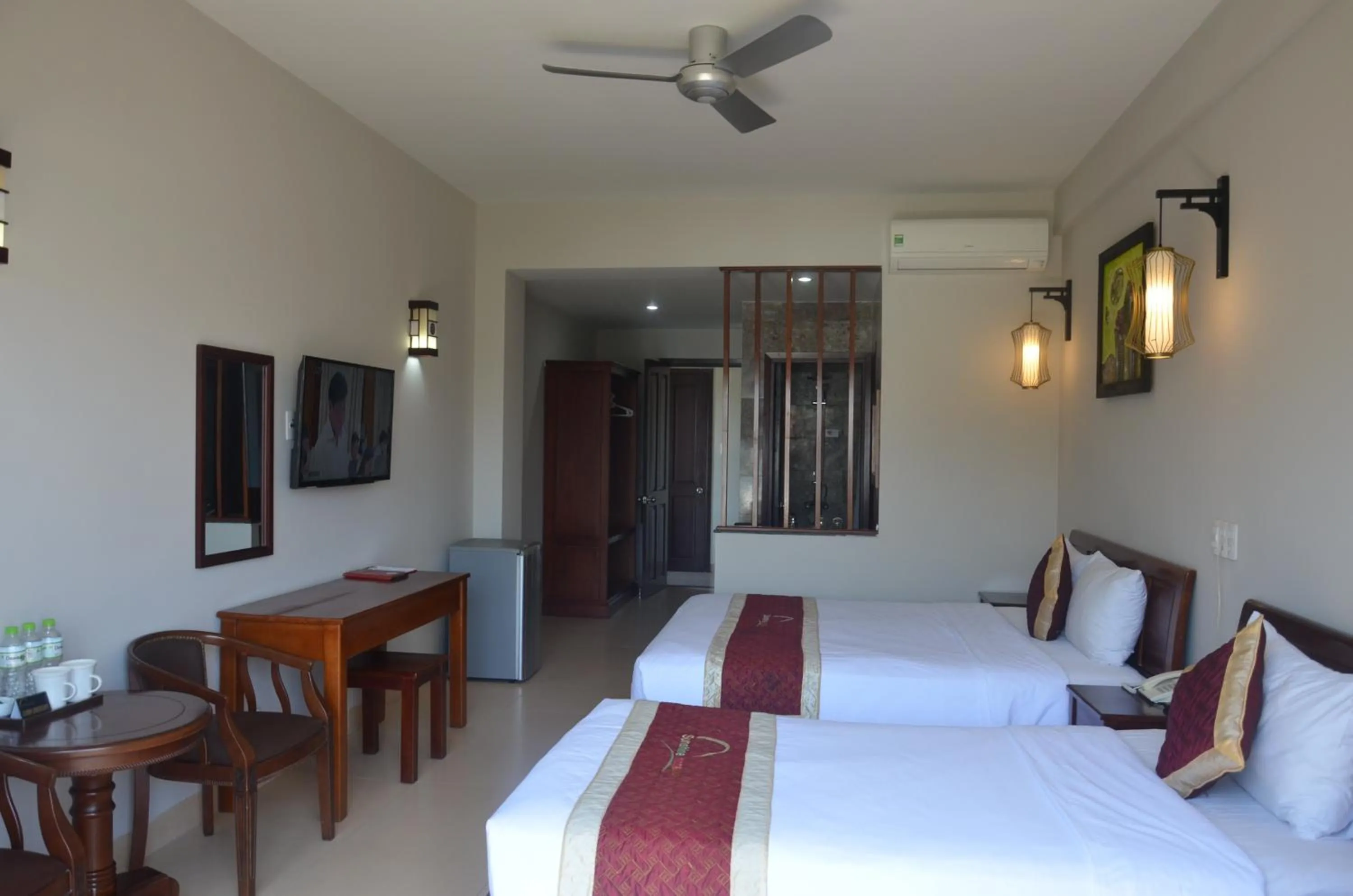 Bed in Sunshine Hoian Hotel