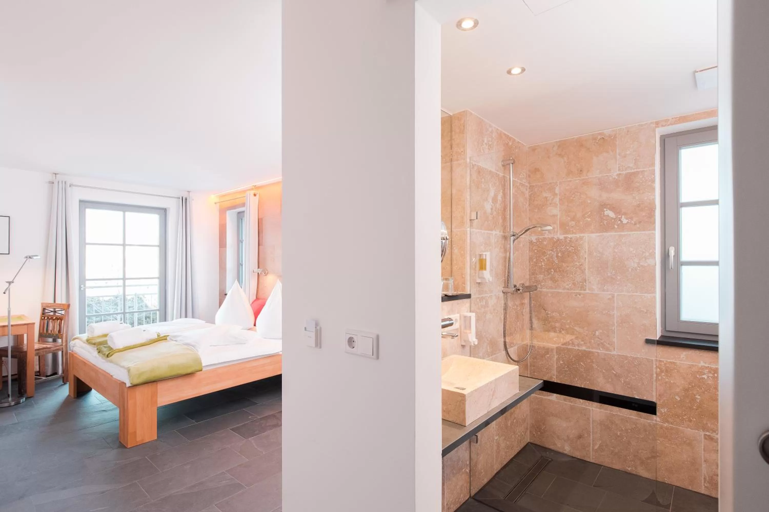 Photo of the whole room, Bed in Biohotel Kunstquartier