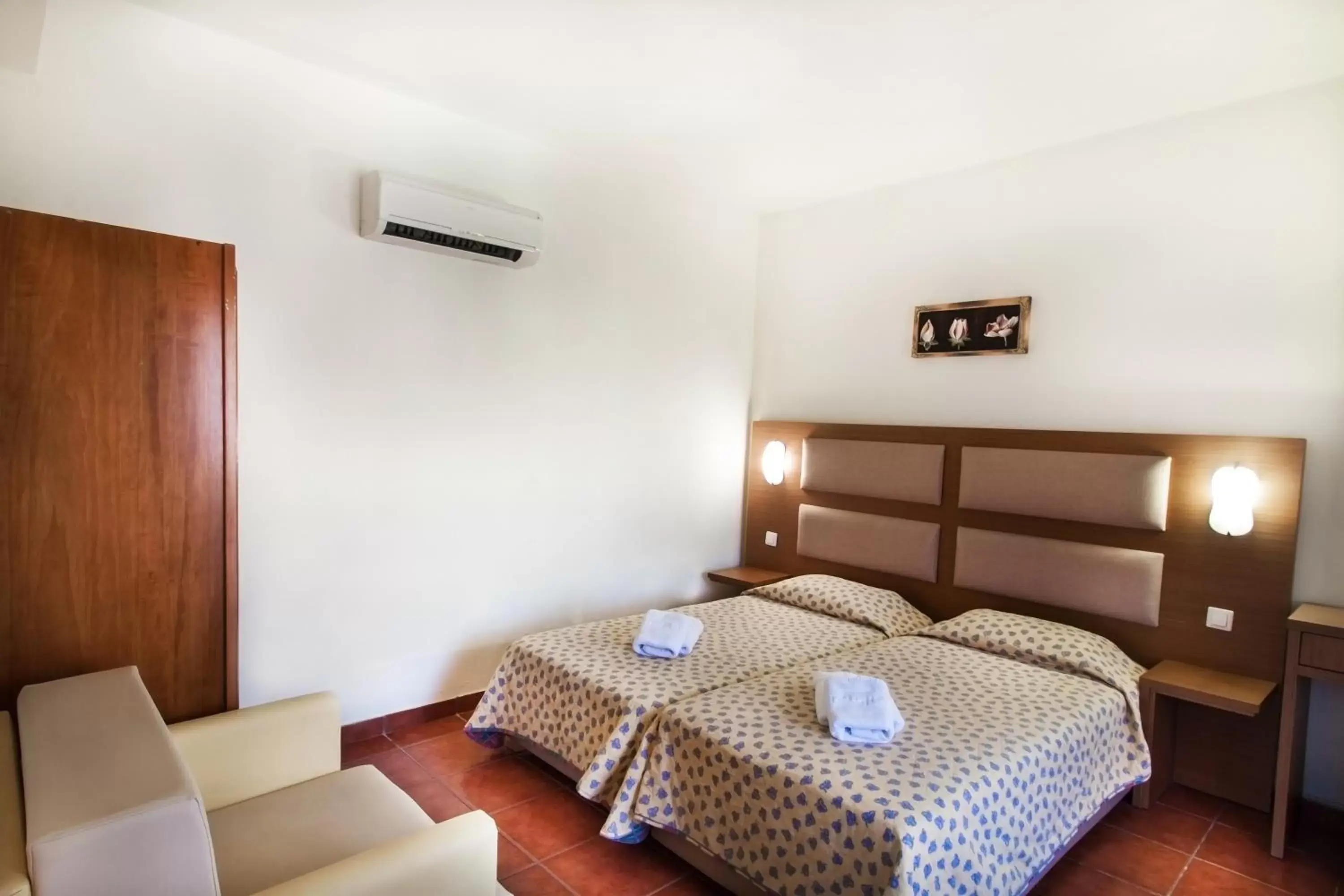 Bed in Rigas Hotel Skopelos