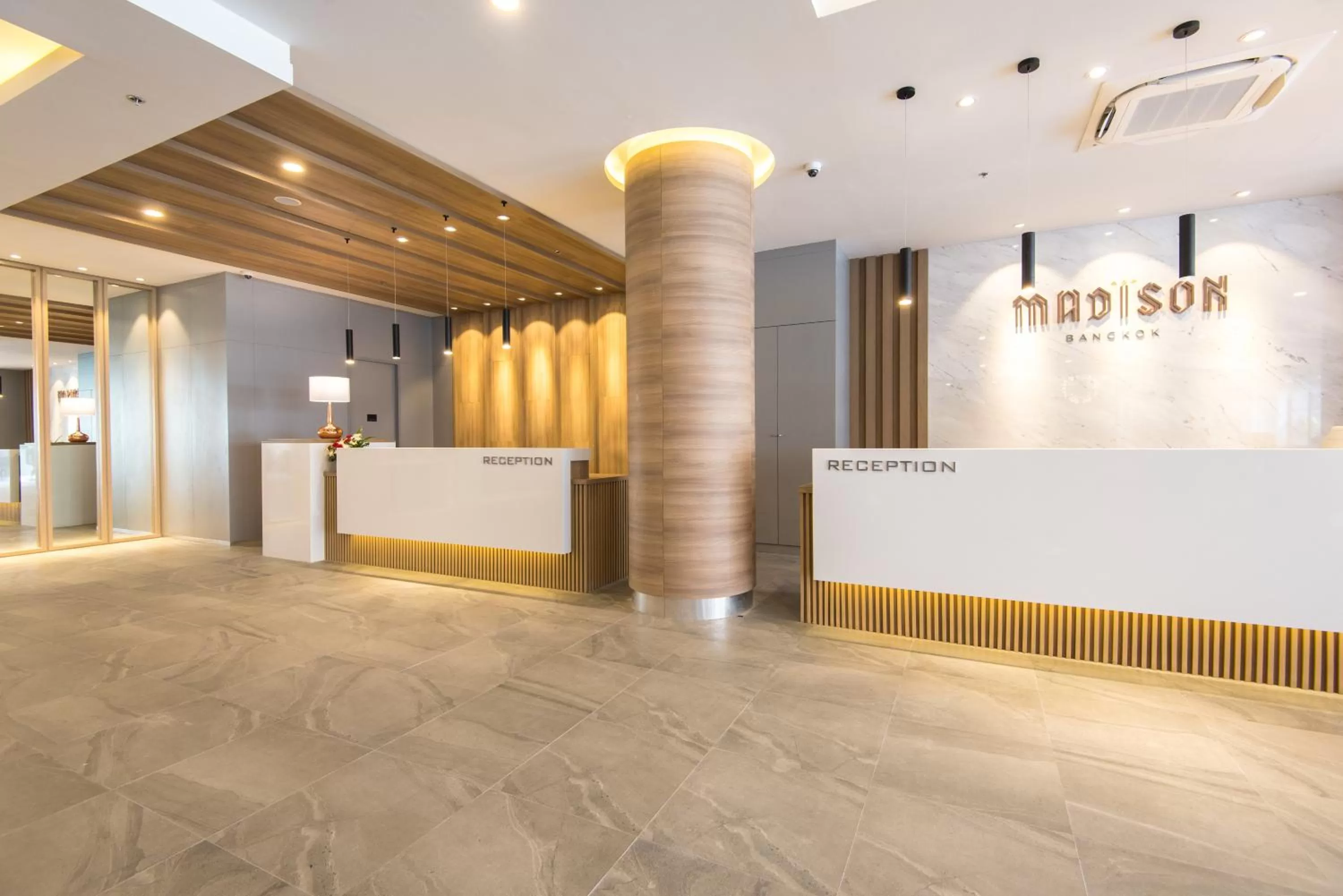 Property logo or sign in Madison Bangkok Hotel