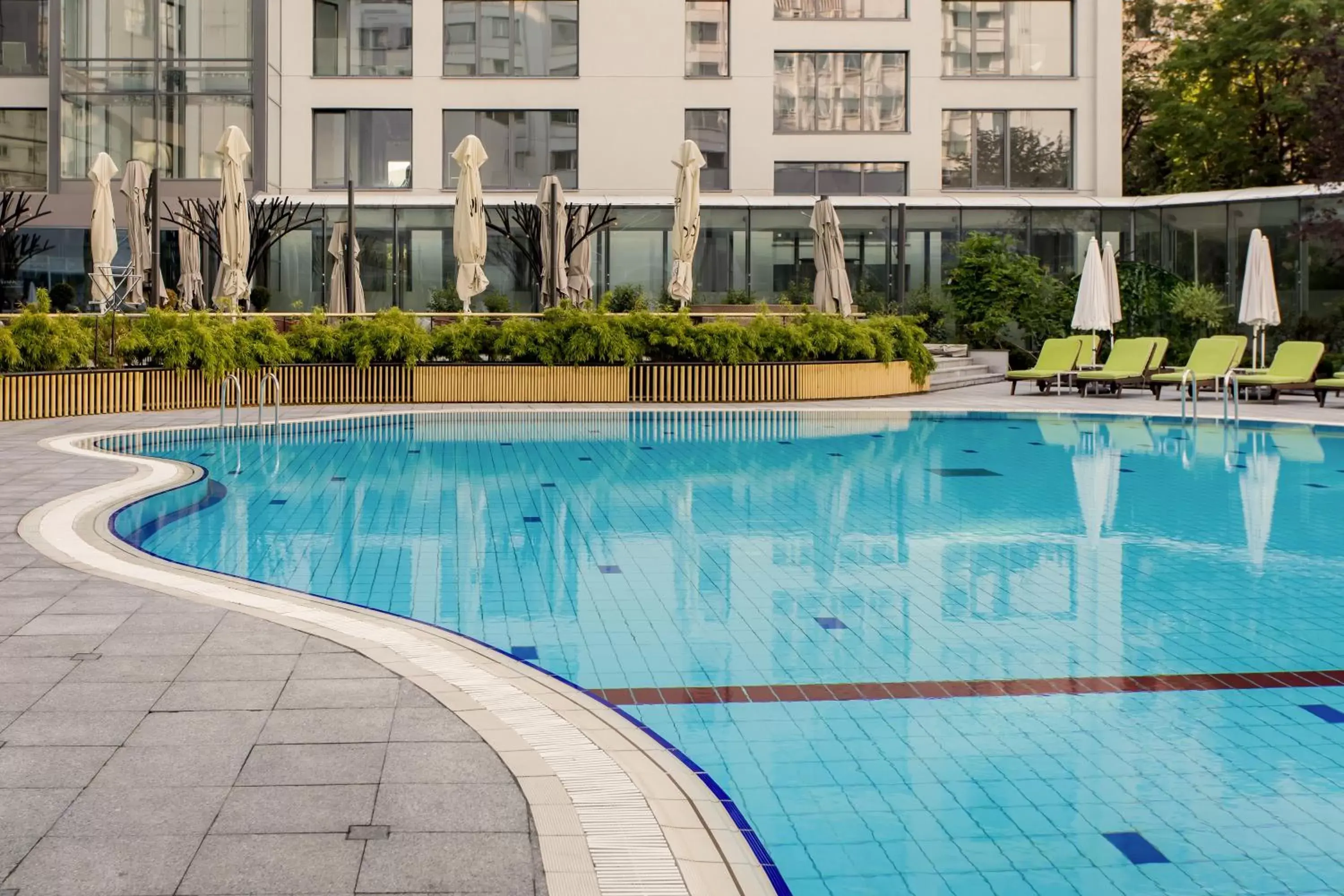 Swimming Pool in Park Inn by Radisson Bucharest Hotel & Residence