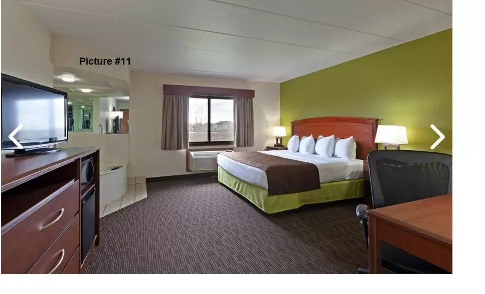 Bed in AmericInn by Wyndham Wahpeton