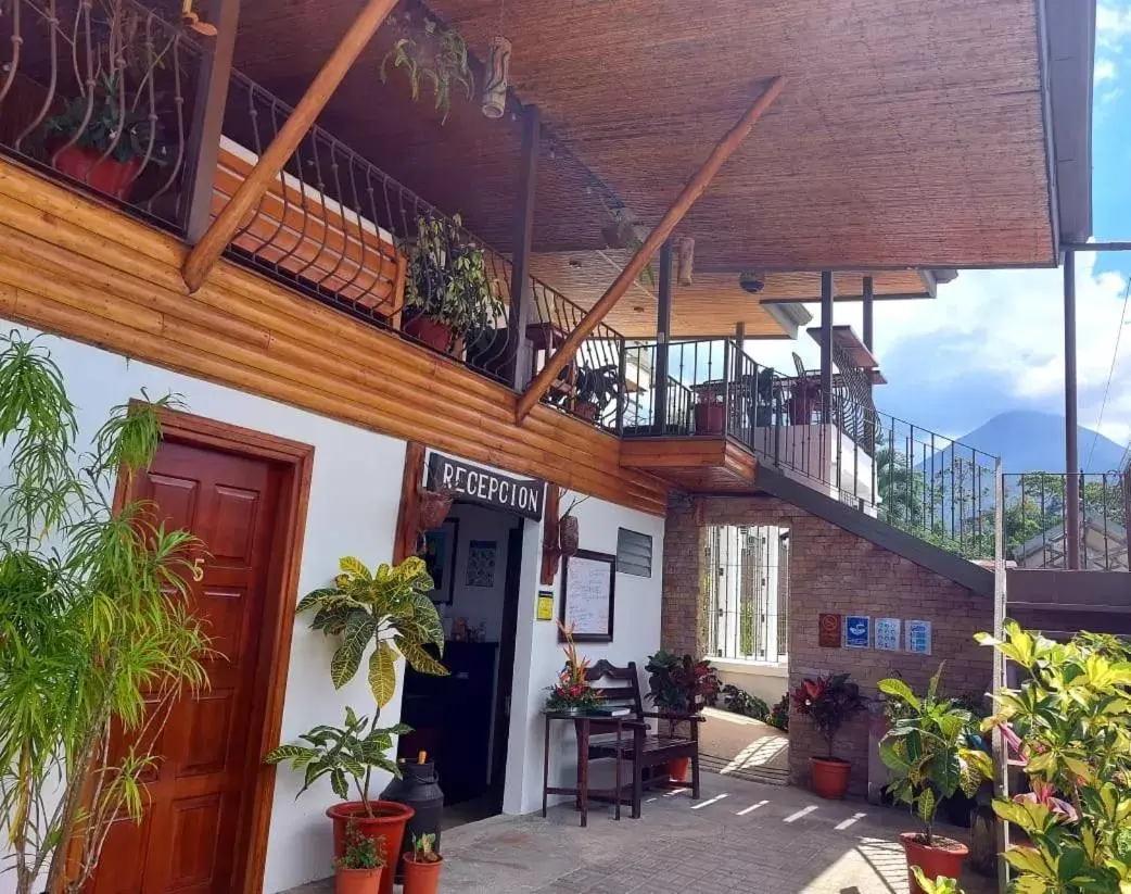 Property building in La Fortuna Lodge by Treebu Hotels