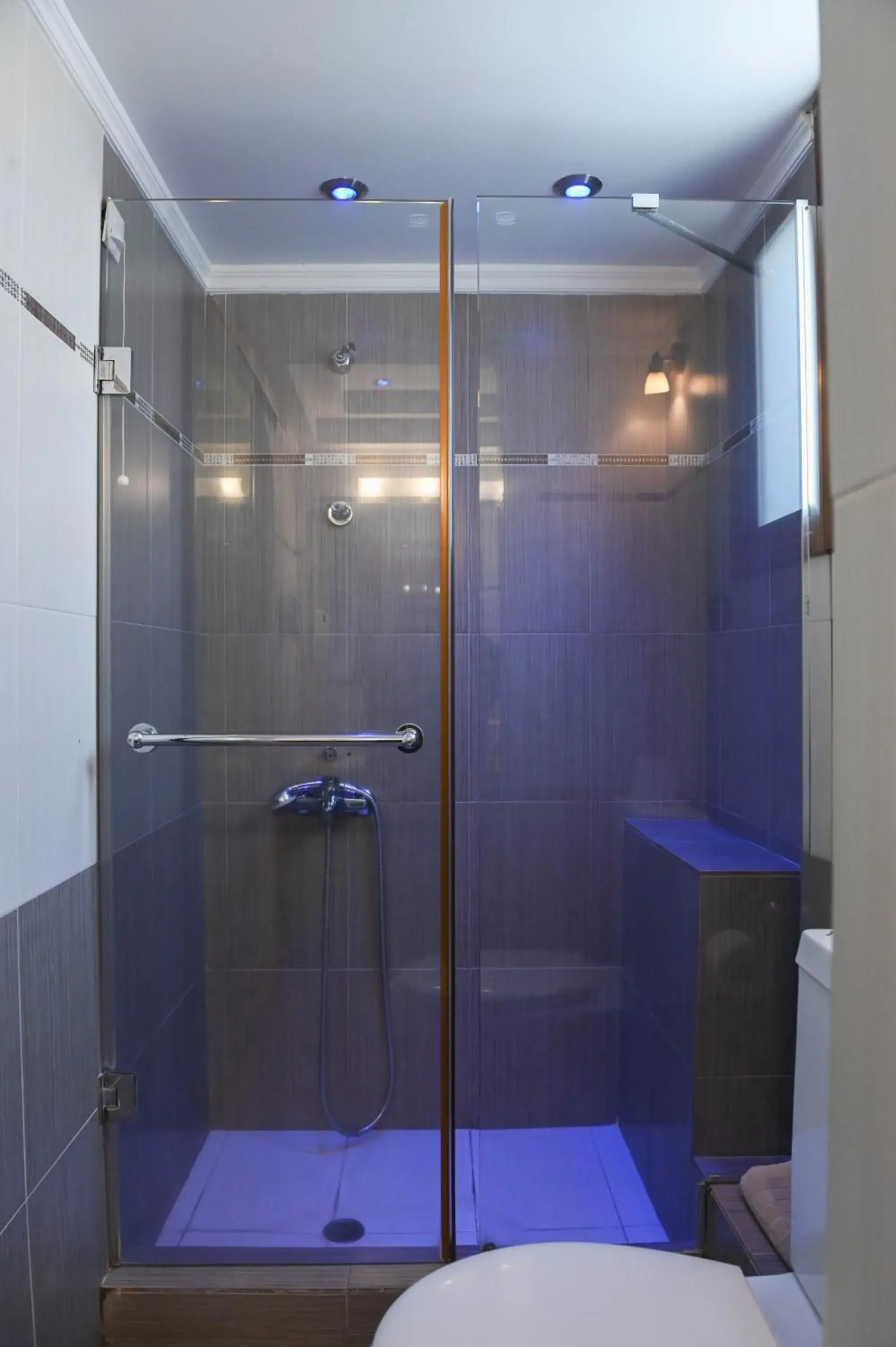 Shower, Bathroom in Amerisa Suites