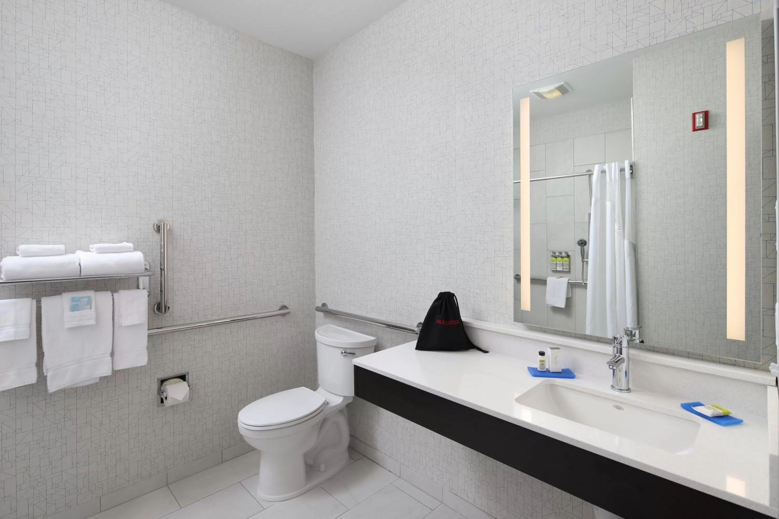 Bathroom in Holiday Inn Express Grand Rapids Southwest by IHG