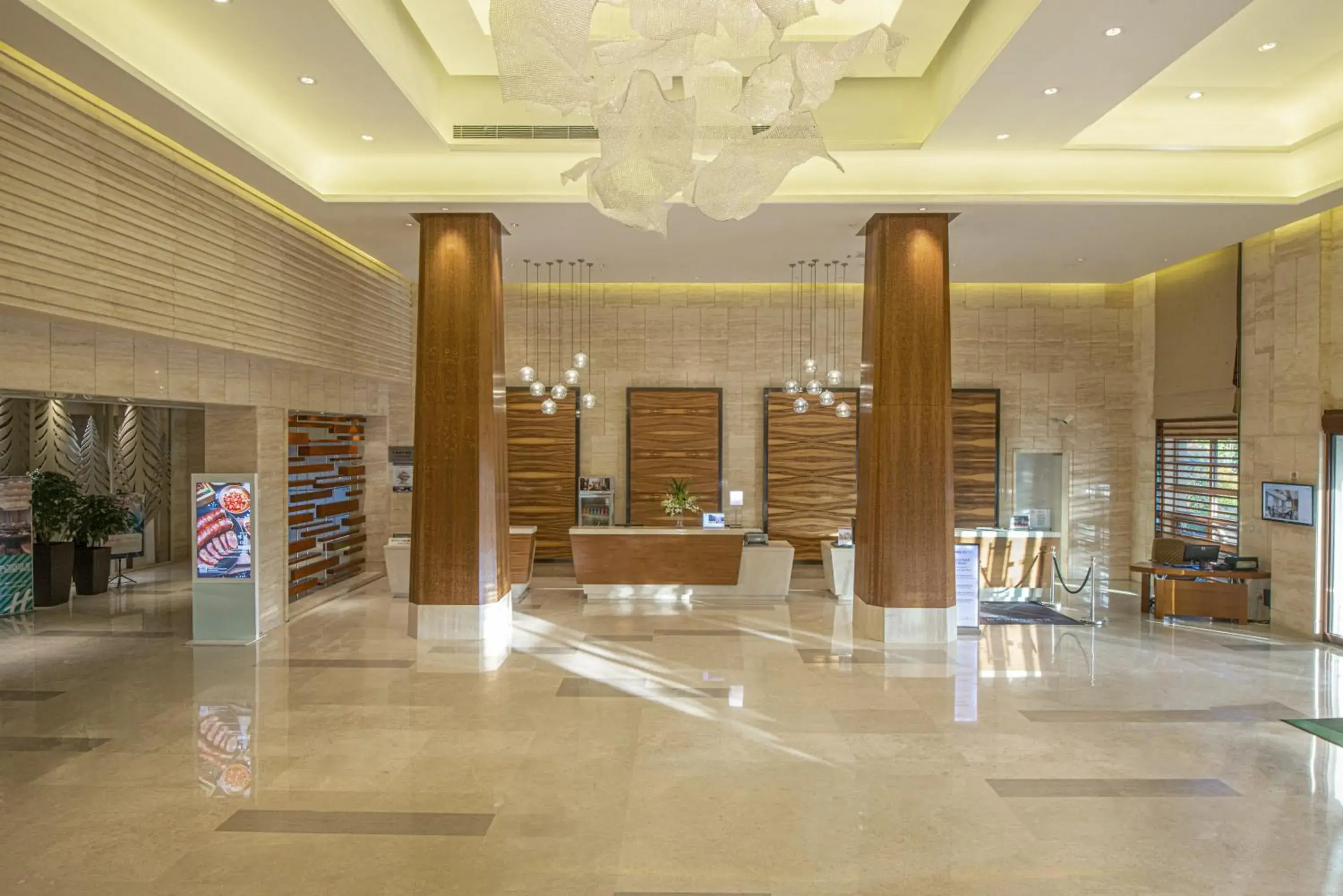 Property building, Lobby/Reception in Holiday Inn Qingdao Expo, an IHG Hotel