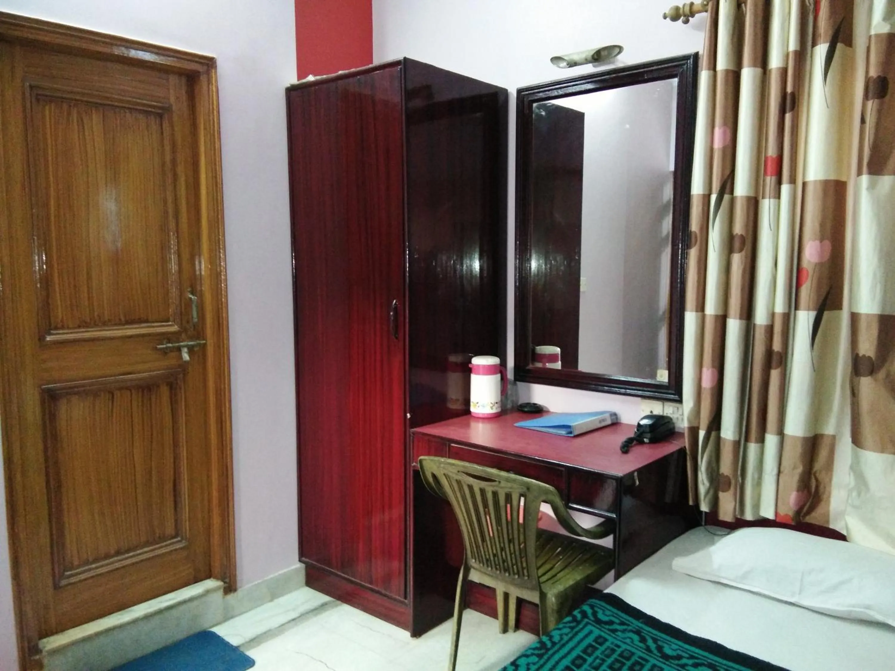 wardrobe, Bed in Hotel Mayur