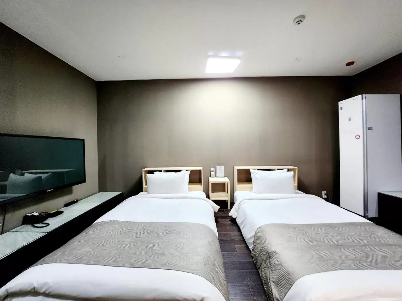 Bed in JS Boutique Hotel