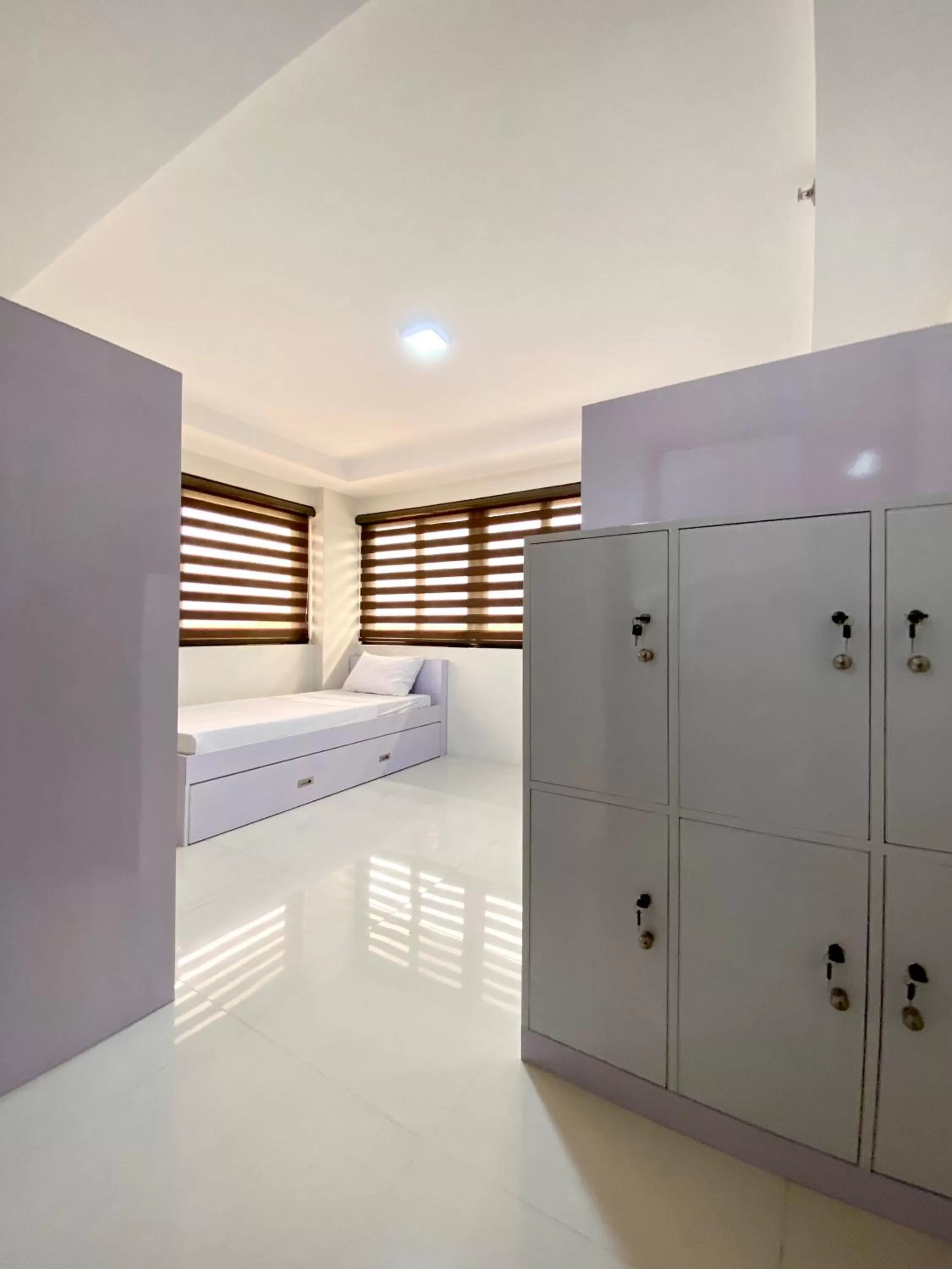 microwave, Bed in Staycation Hotel