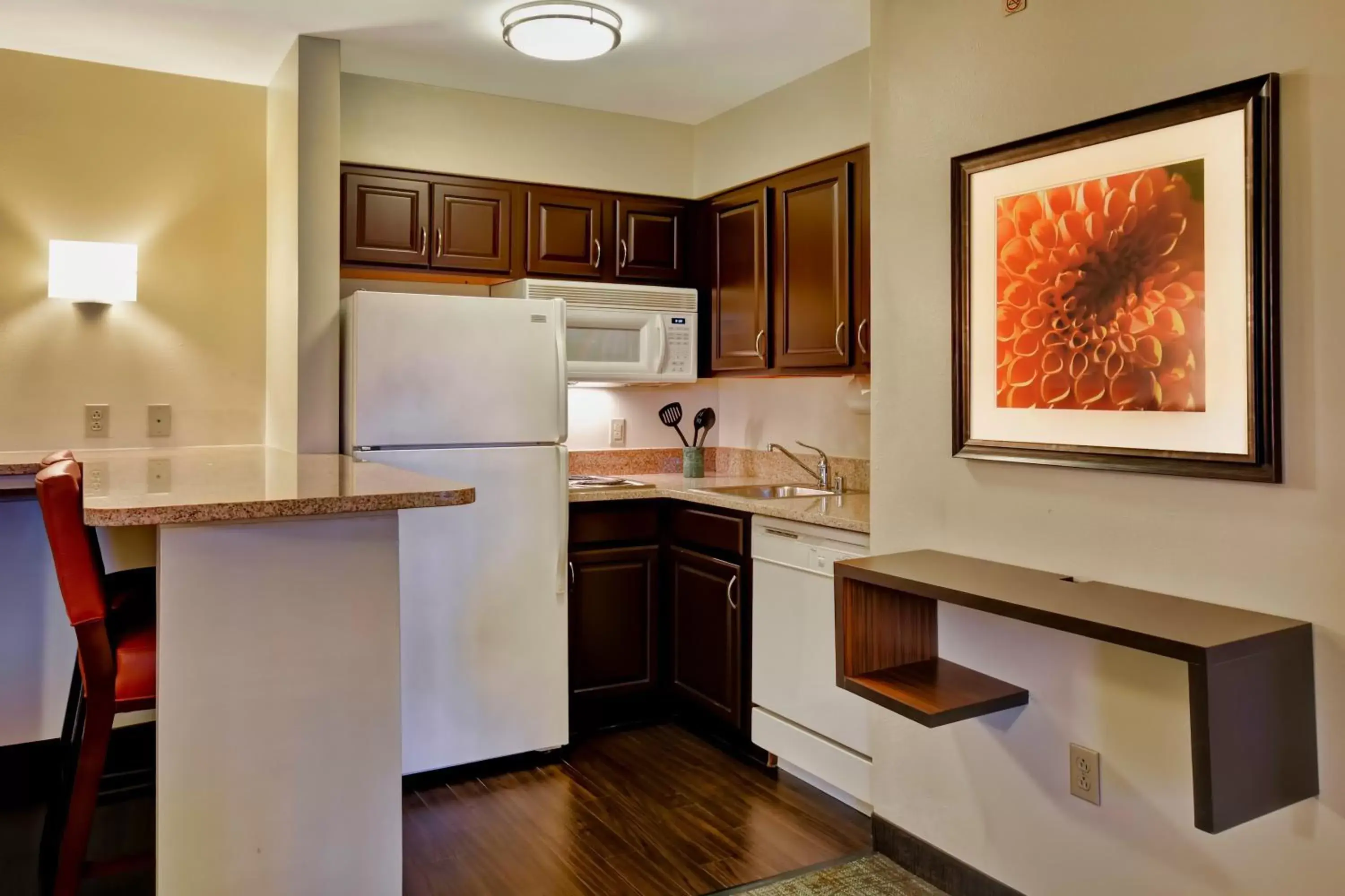 Photo of the whole room, Kitchen/Kitchenette in Staybridge Suites Madison - East, an IHG Hotel