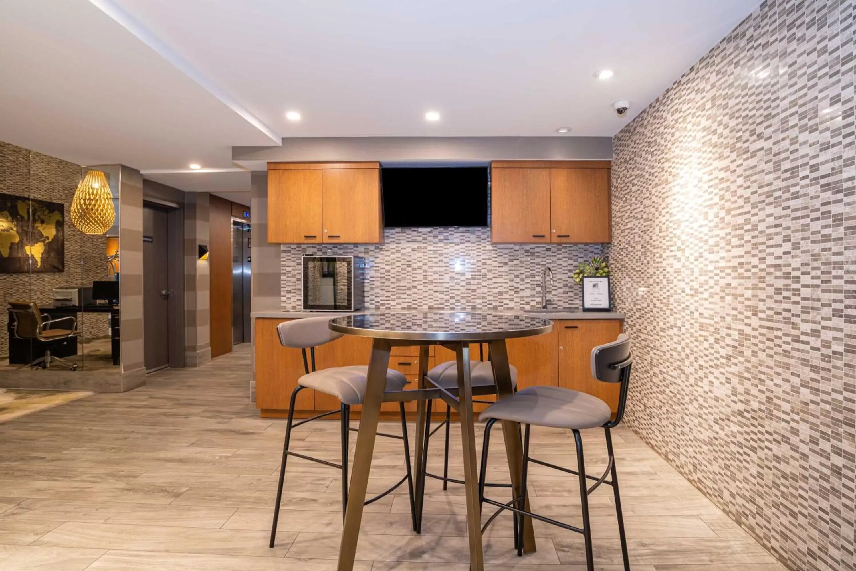 Lobby or reception in Sandman Hotel Hamilton Lobby or reception in Sandman Hotel Hamilton