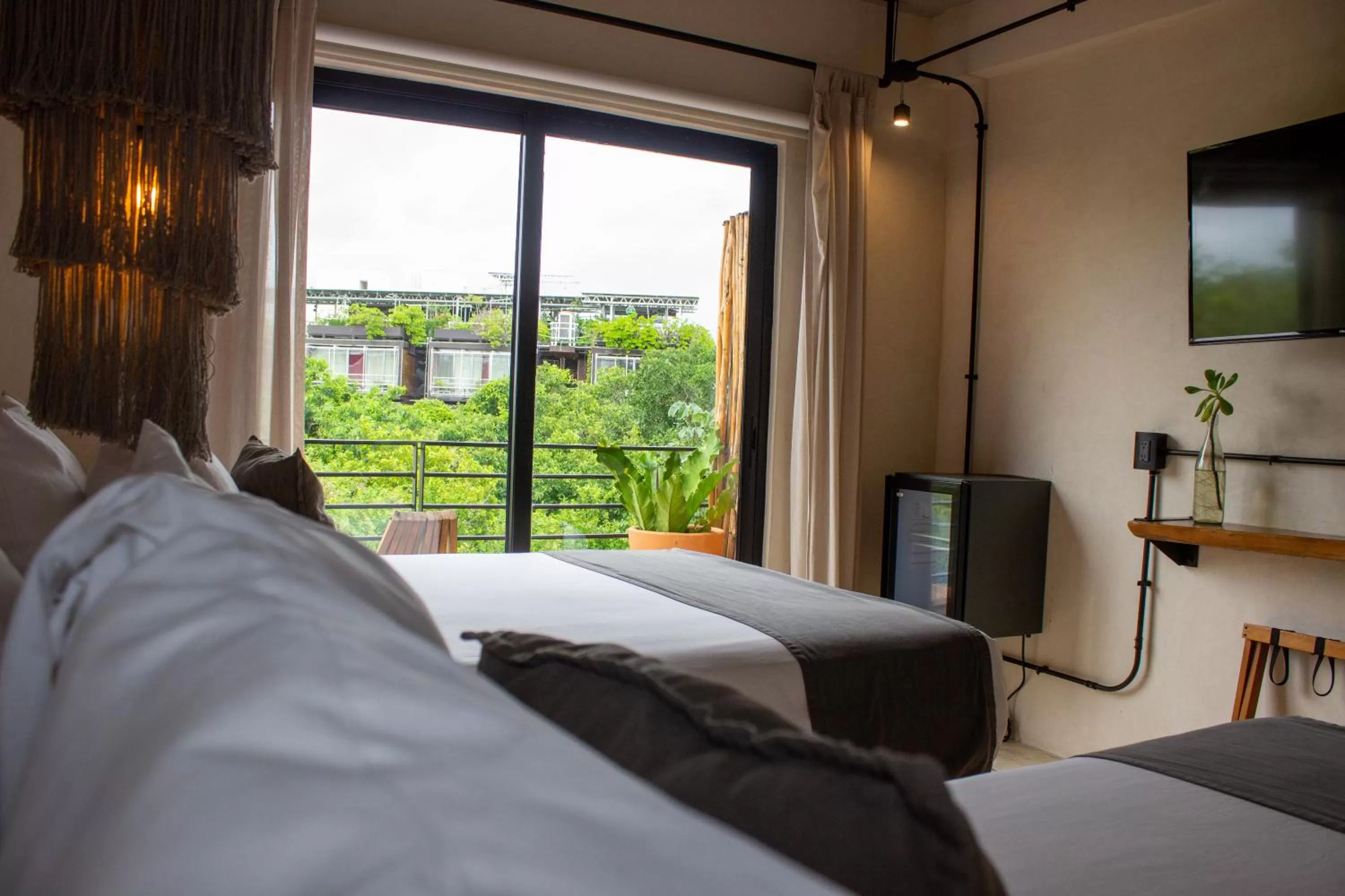 Bed in Caribbean Paradise Hotel & Spa - 5th Avenue