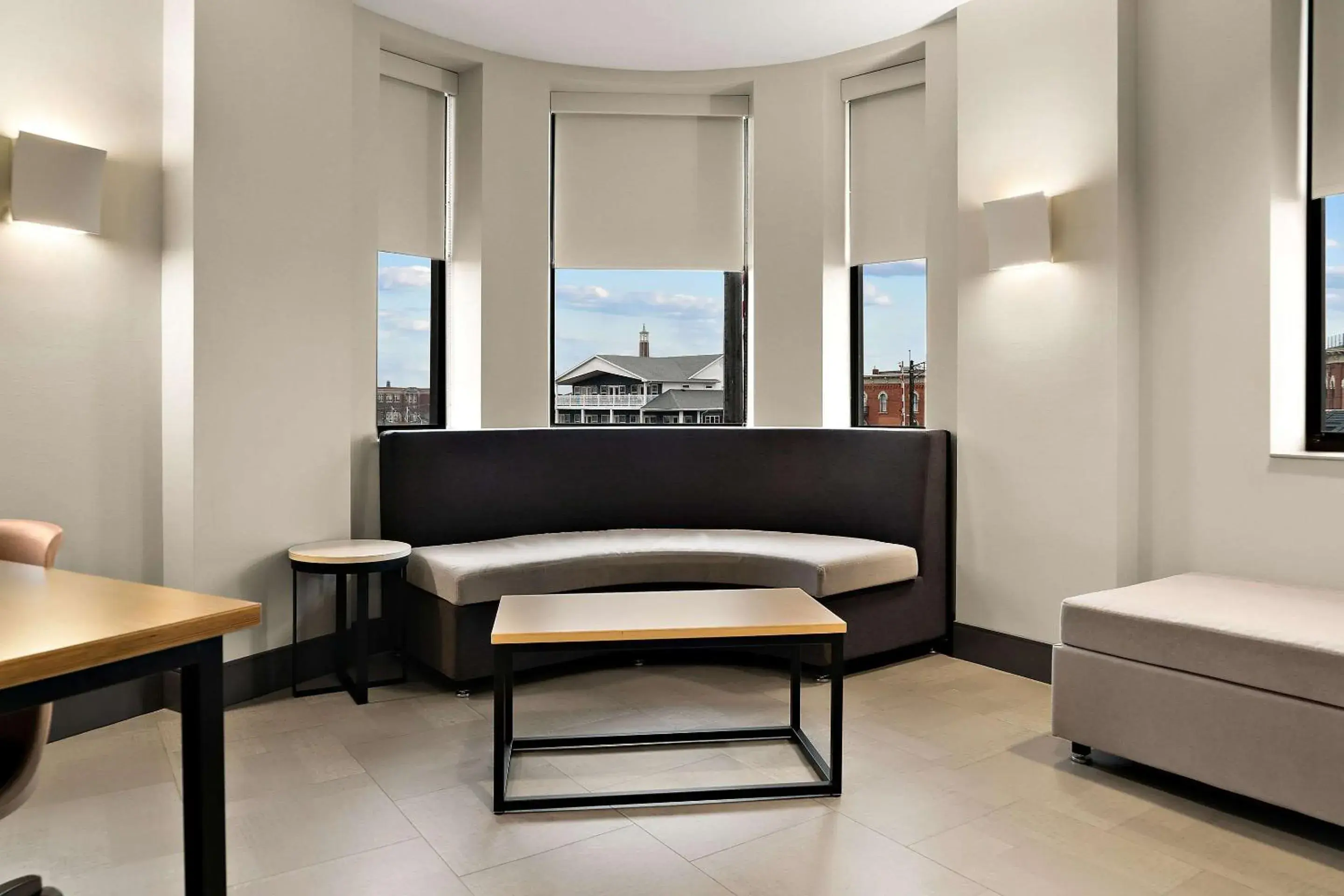 Bedroom, Seating Area in CityFlatsHotel - Port Huron, Ascend Hotel Collection