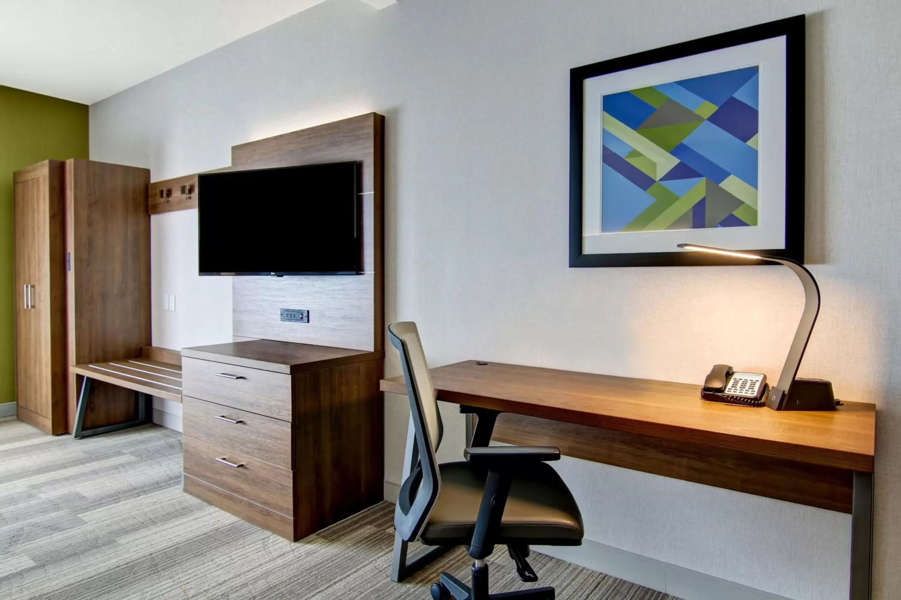 Photo of the whole room, TV/Entertainment Center in Holiday Inn Express Hotel & Suites Toronto - Markham, an IHG Hotel