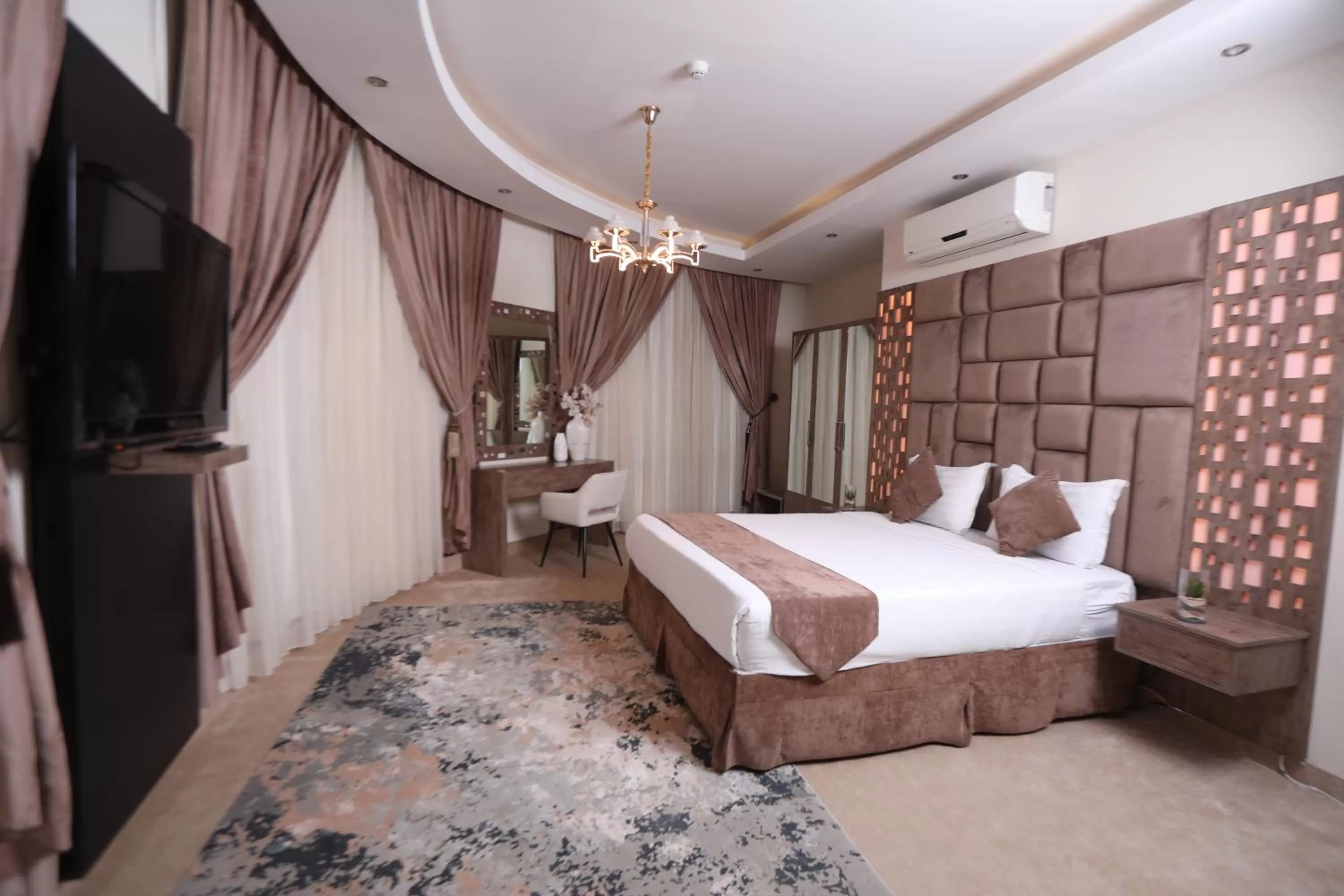 Living room, Bed in Samaya Suites