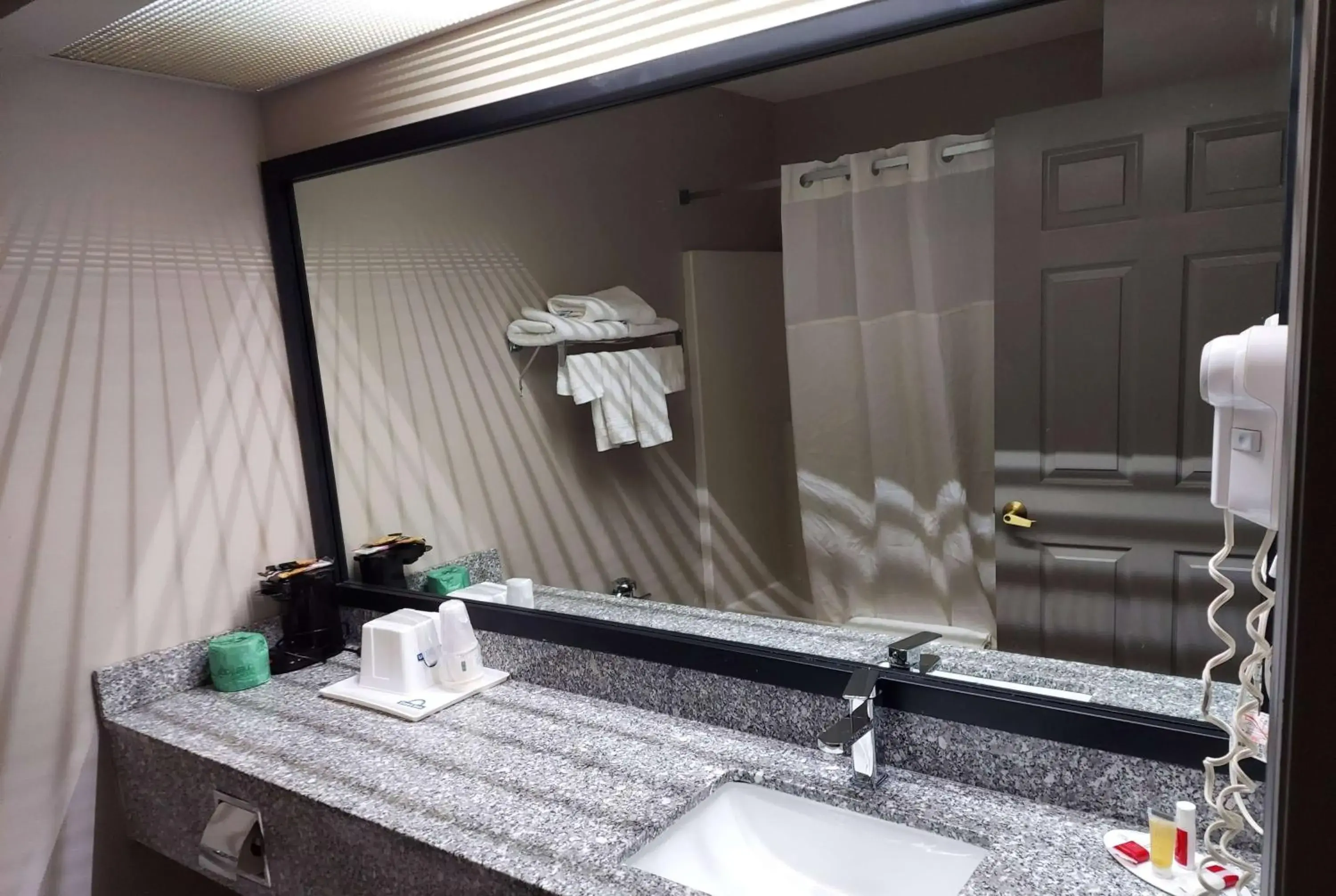 Photo of the whole room, Bathroom in Days Inn & Suites by Wyndham Huntsville