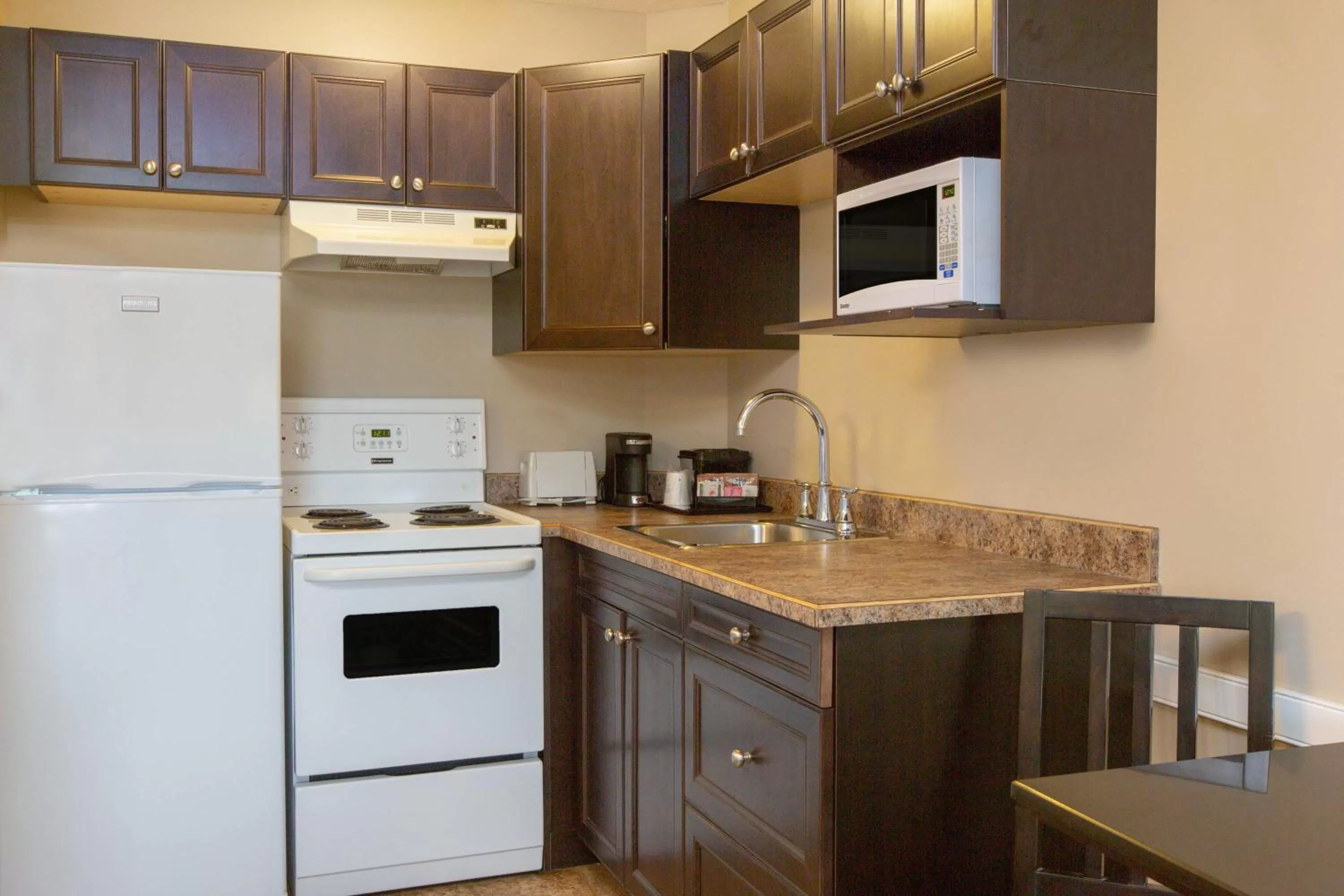 Kitchen or kitchenette in Super 8 by Wyndham Fort McMurray
