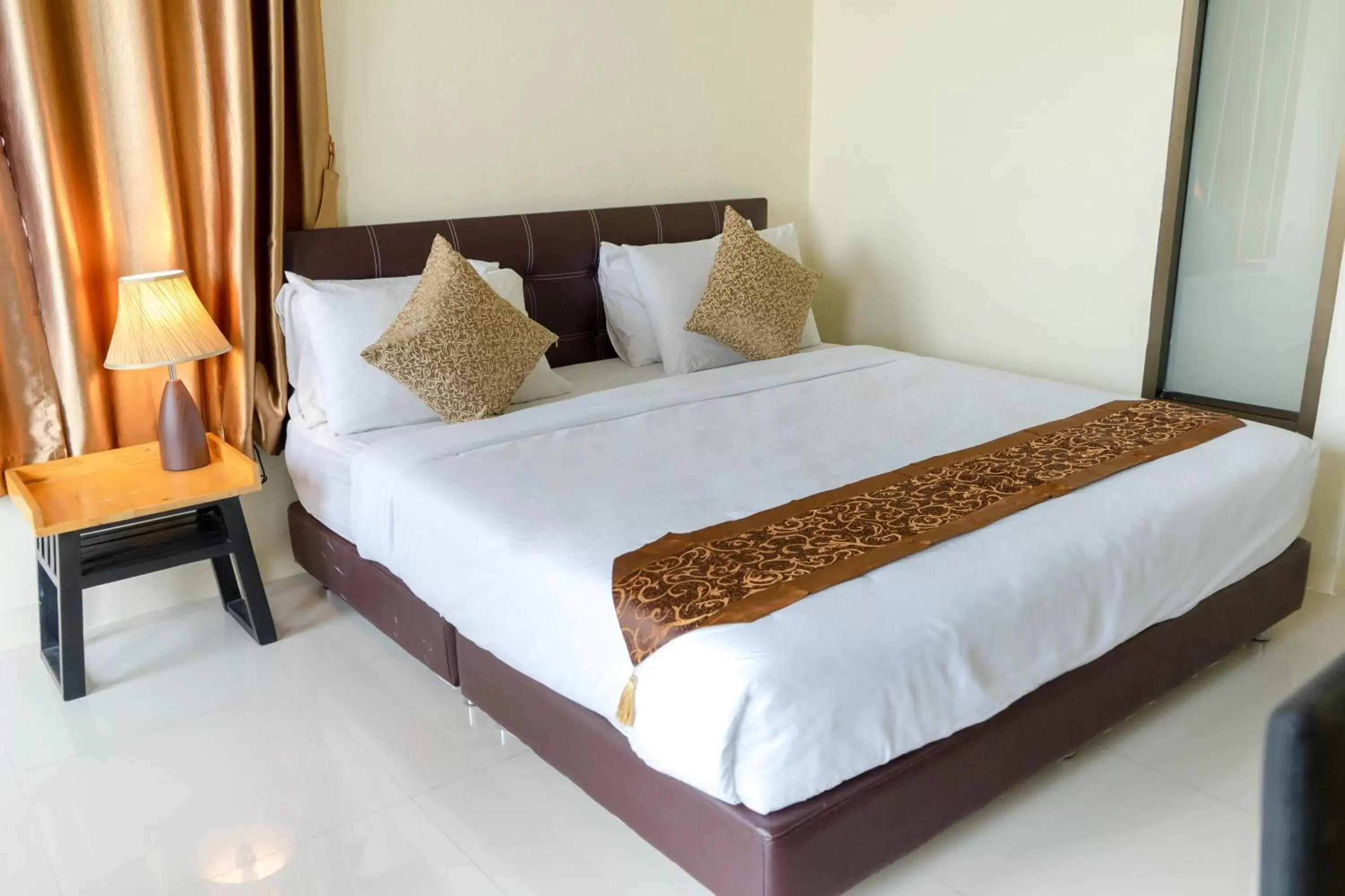 Bed in Sasi Nonthaburi Hotel