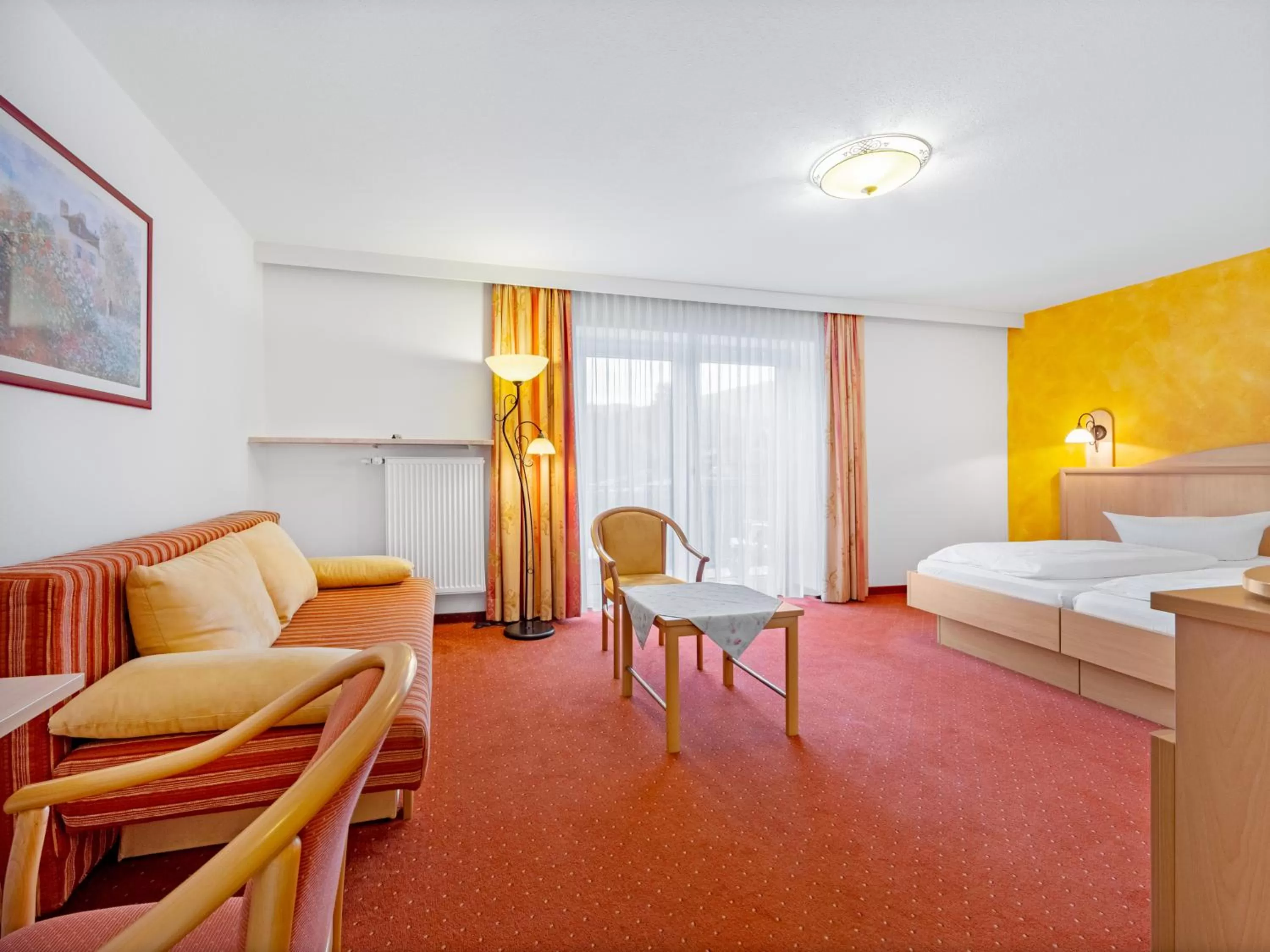 Living room, Bed in Landhotel Gabriele