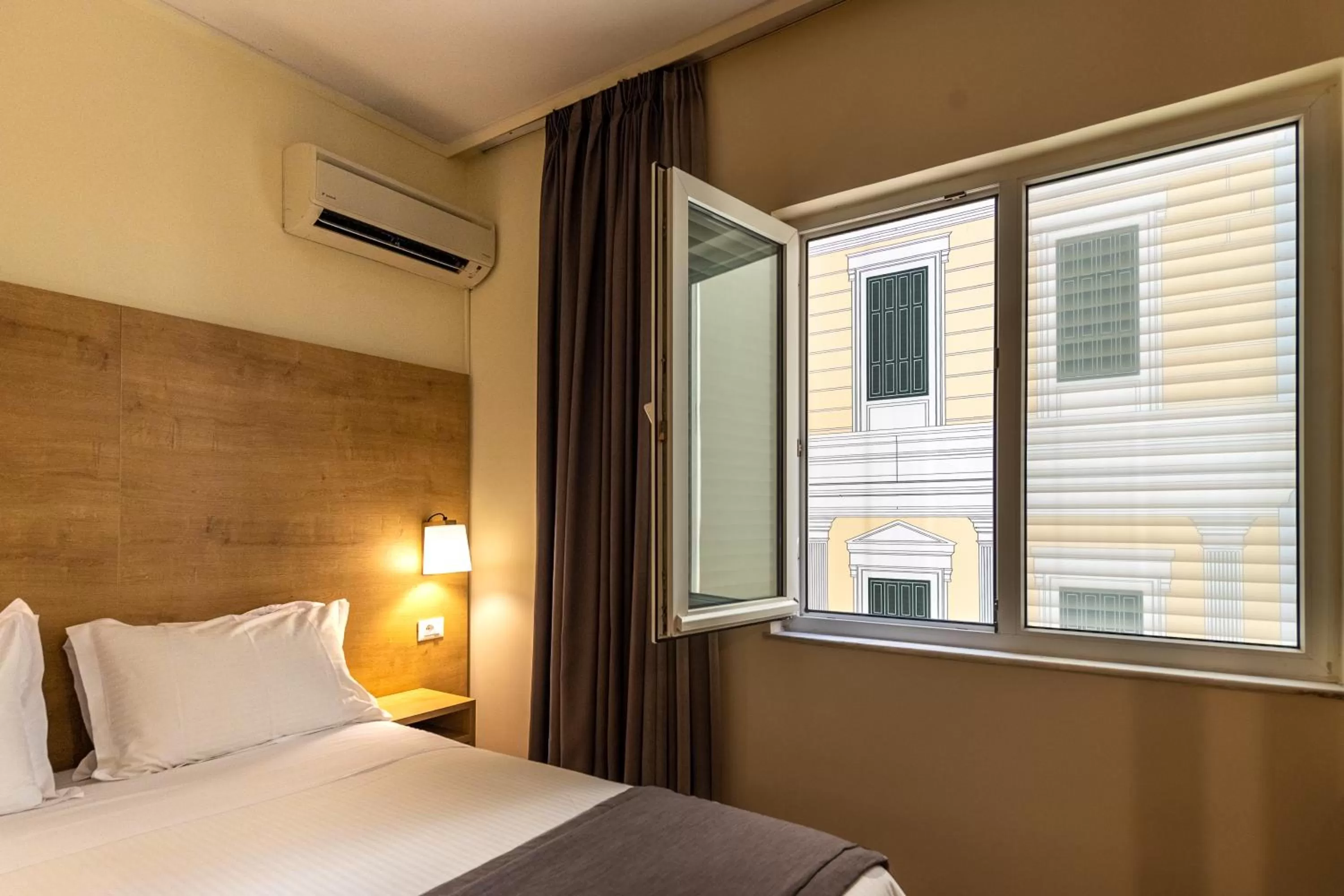 View (from property/room), Bed in Polis Grand Hotel