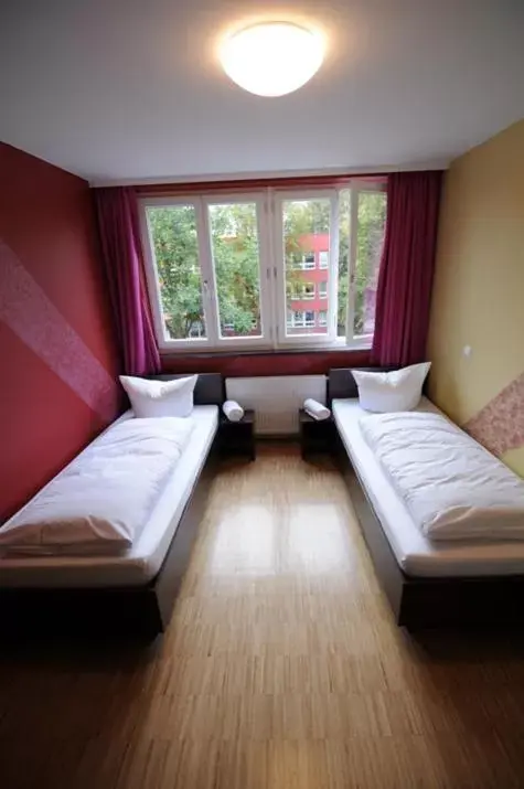 Photo of the whole room, Bed in HOLI-Berlin Hotel