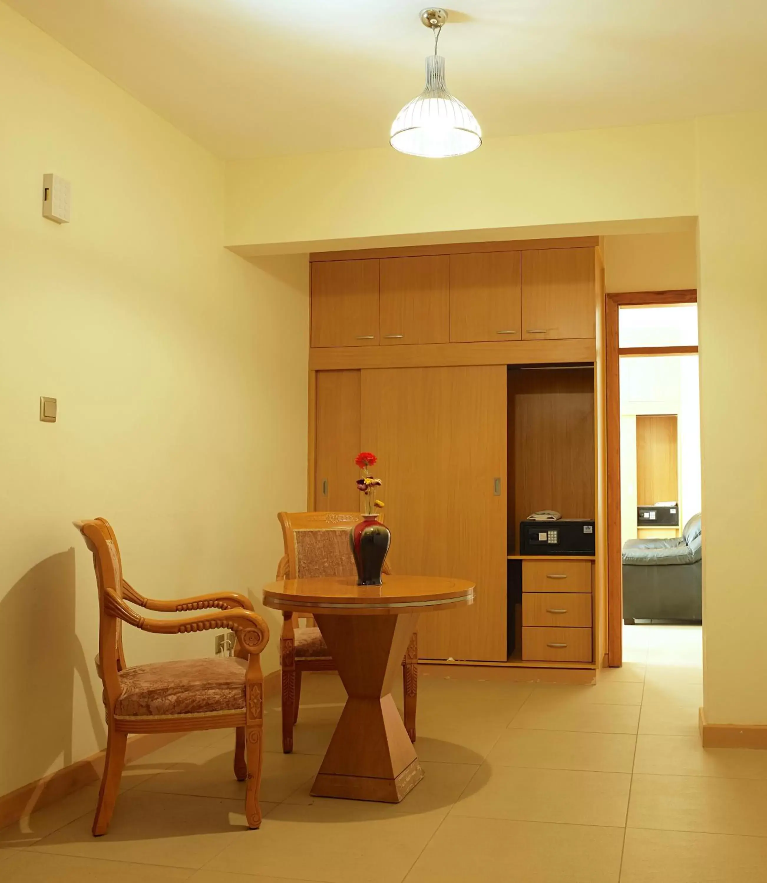 Living room, Kitchen/Kitchenette in Lotos Inn & Suites, Nairobi