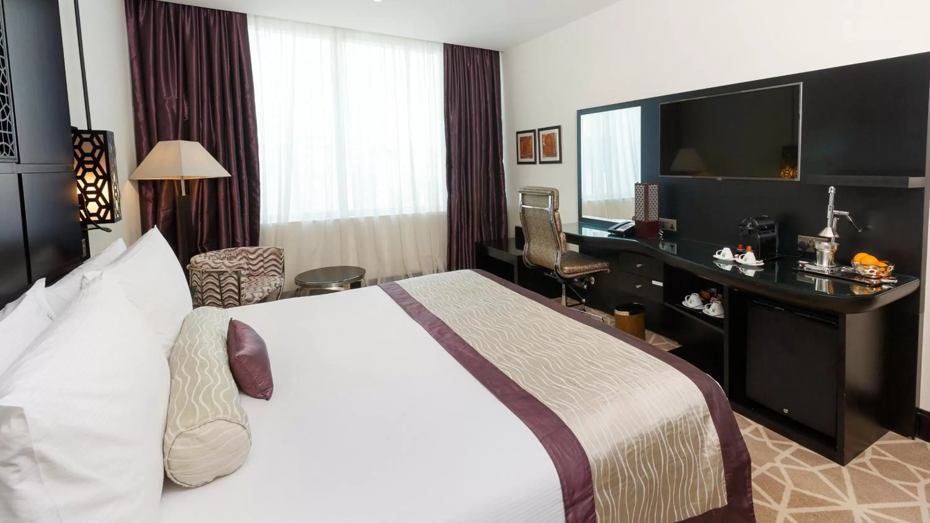 Photo of the whole room, TV/Entertainment Center in Holiday Inn Dubai Al Barsha, an IHG Hotel