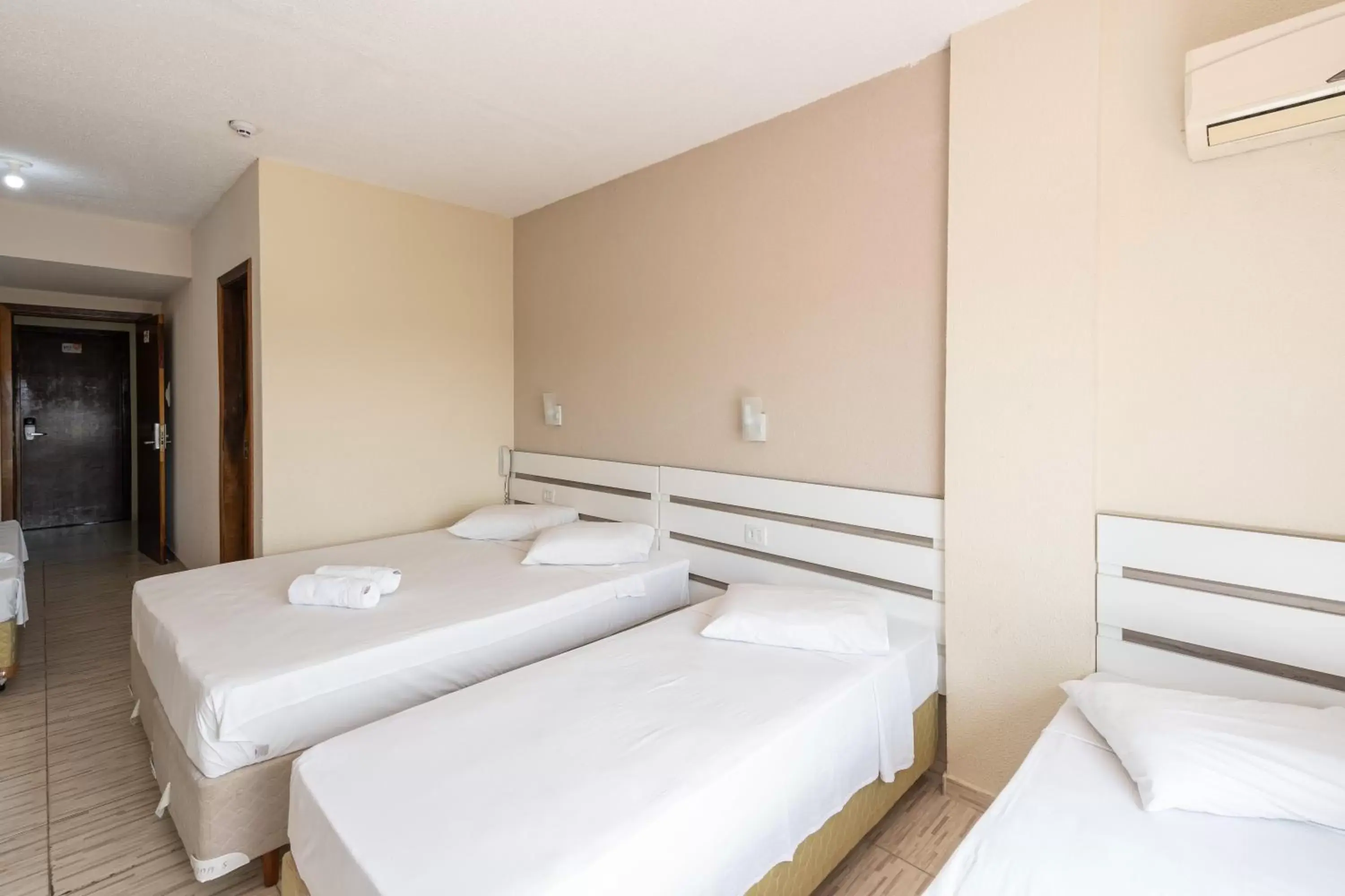 Bed in Hotel Conexão