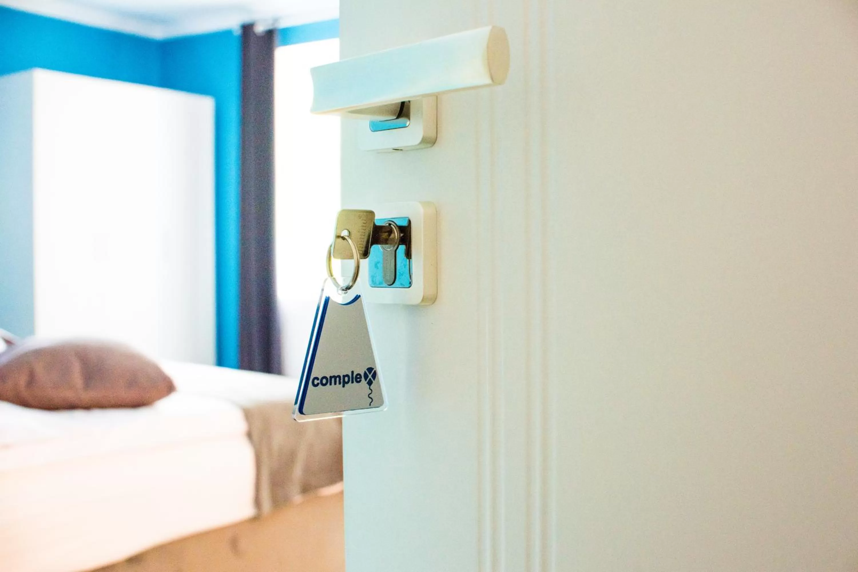 Facade/entrance, Bed in compleX living aparthotel