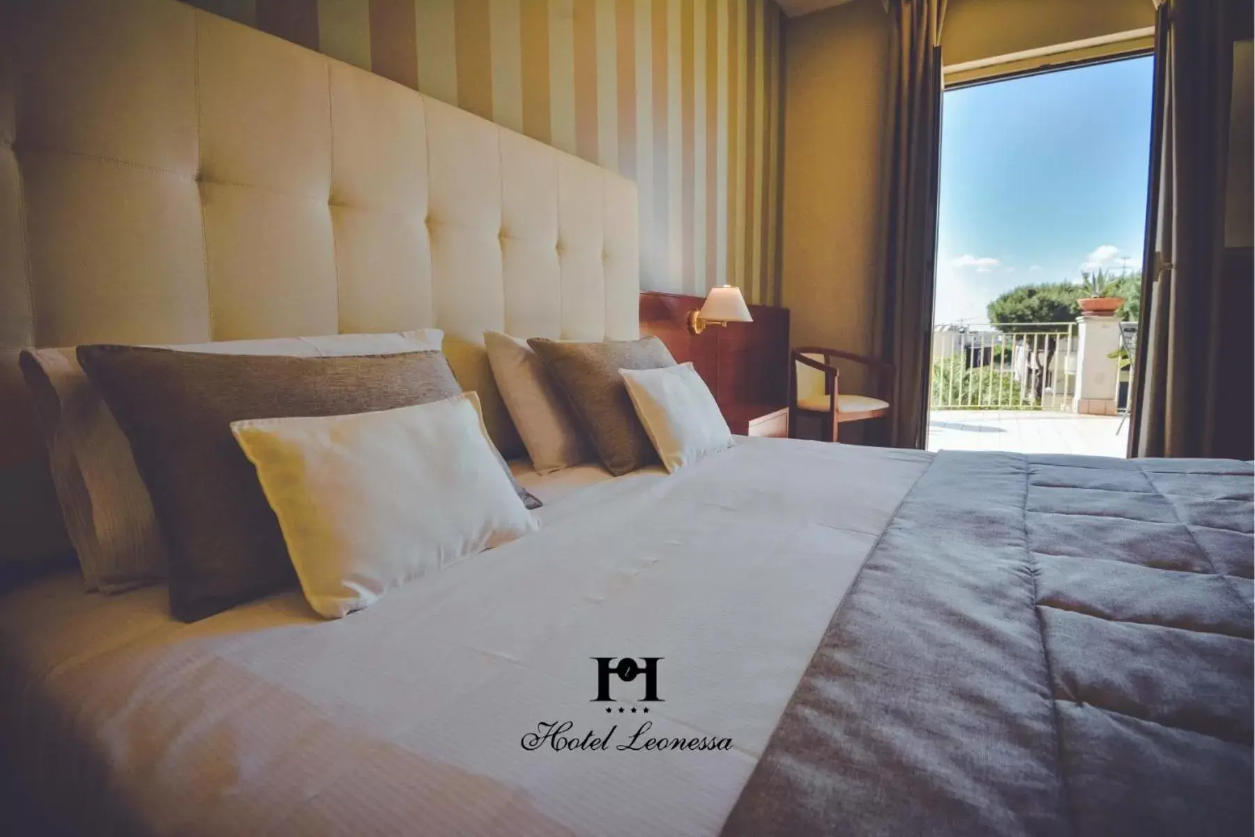 Bed in Hotel Leonessa