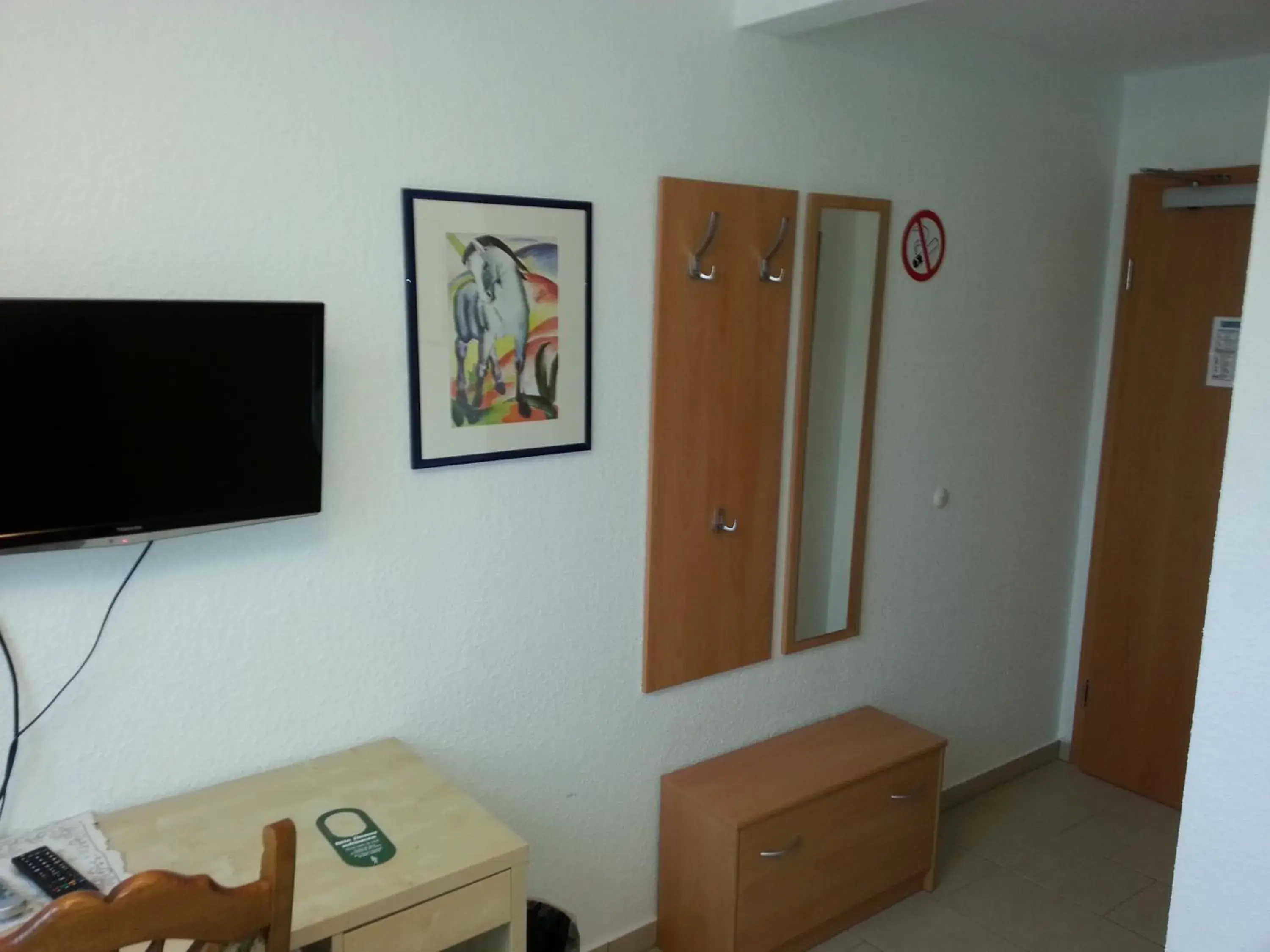 TV and multimedia, TV/Entertainment Center in Hotel Am Kamin