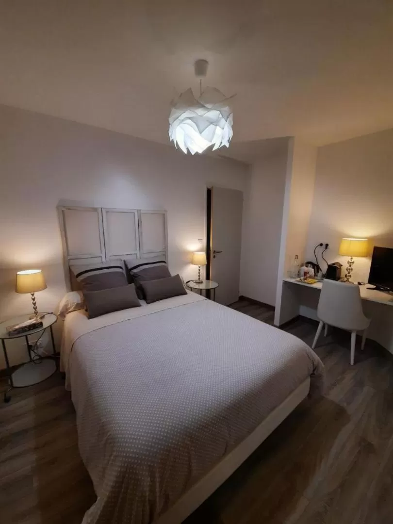 Bed in AGATHE chambres d'hôtes