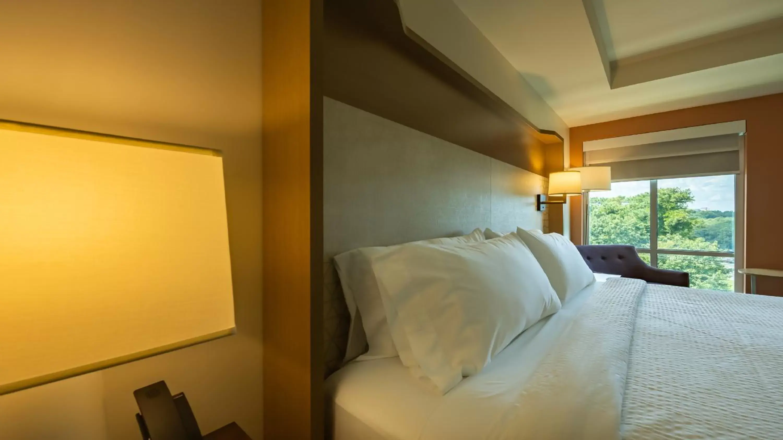 Bed in Holiday Inn & Suites Atlanta Perimeter Dunwoody, an IHG Hotel