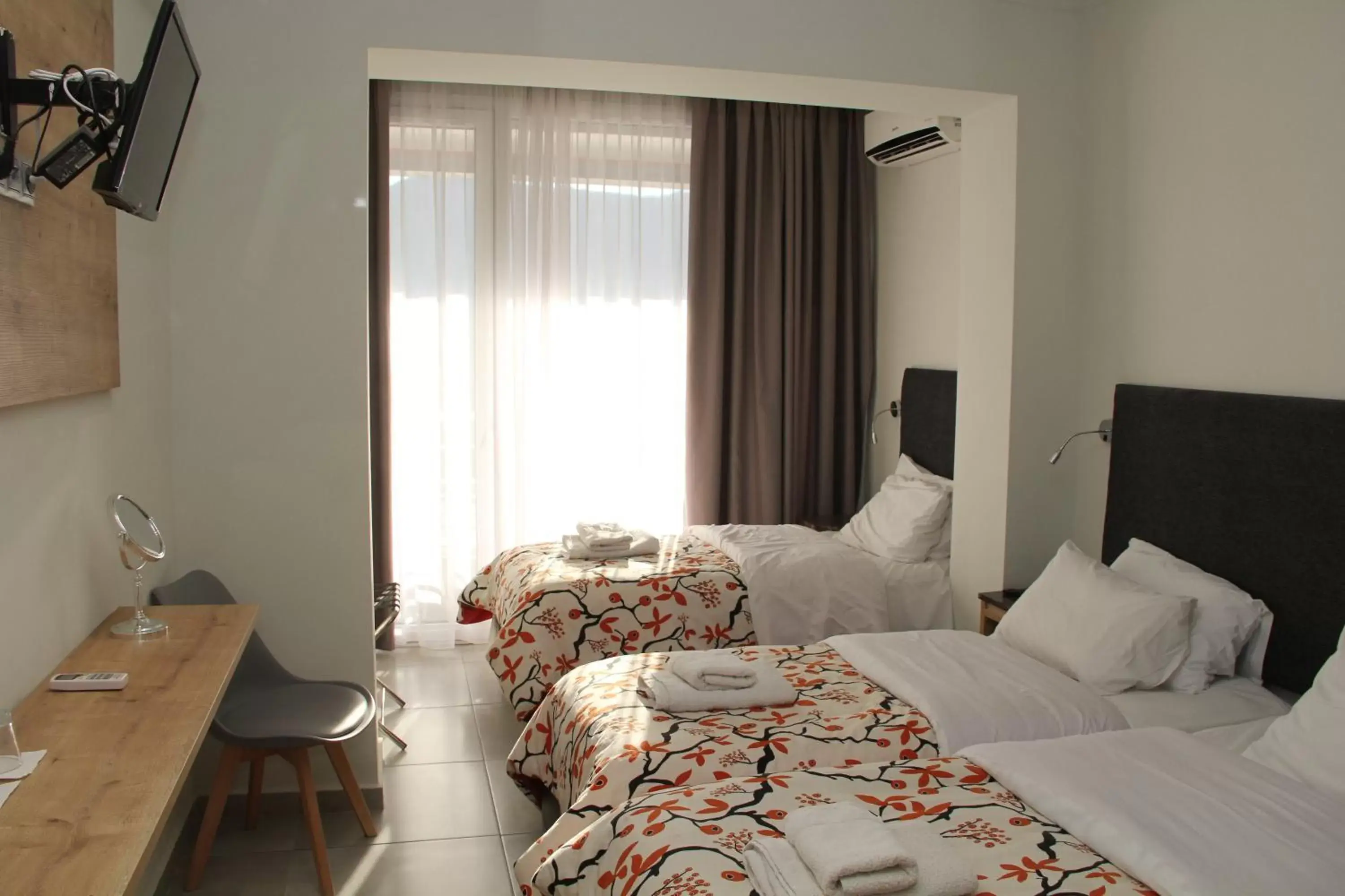 Photo of the whole room, Bed in Alexiou Hotel