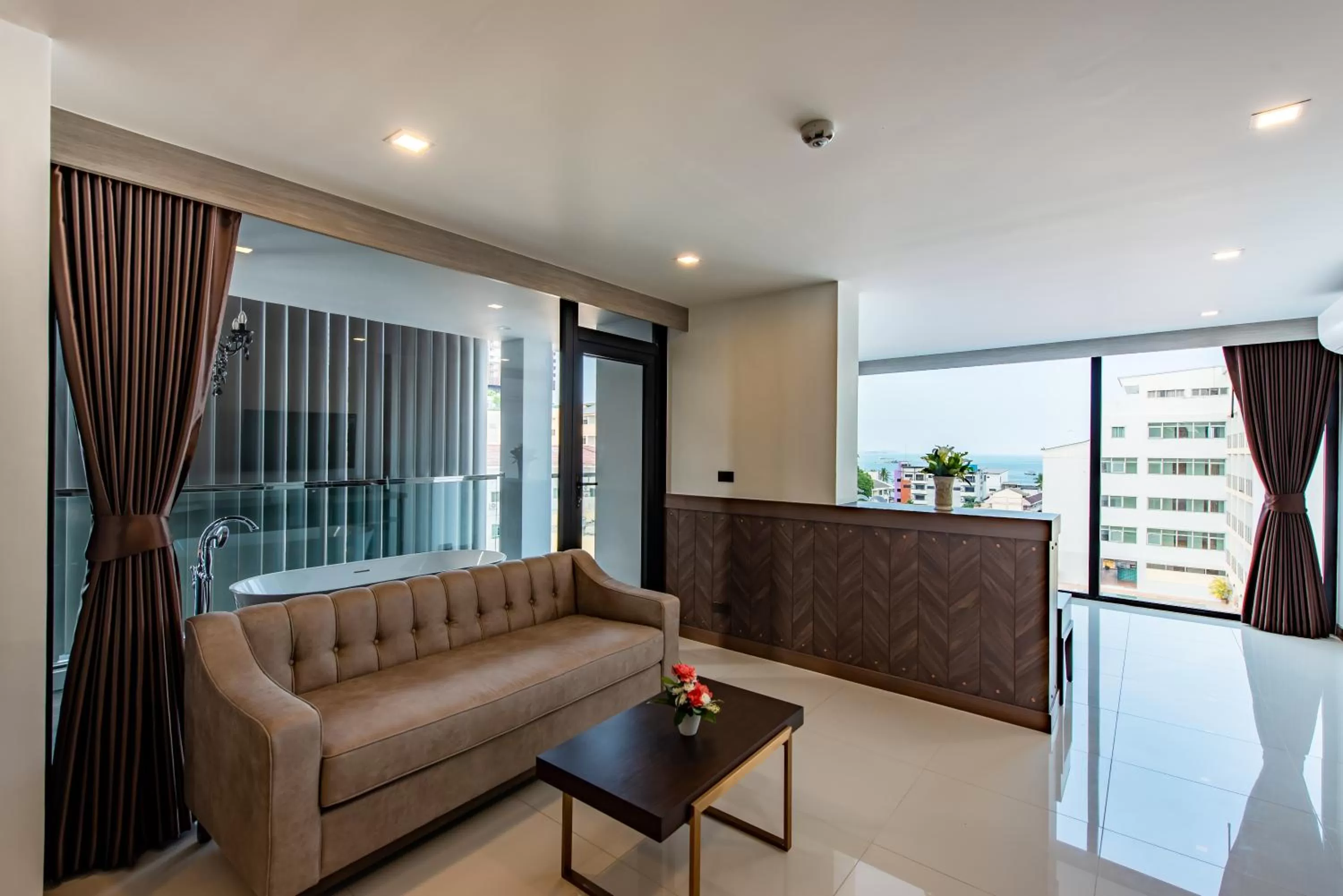 Living room in Blackwoods Hotel Pattaya - SHA Extra Plus