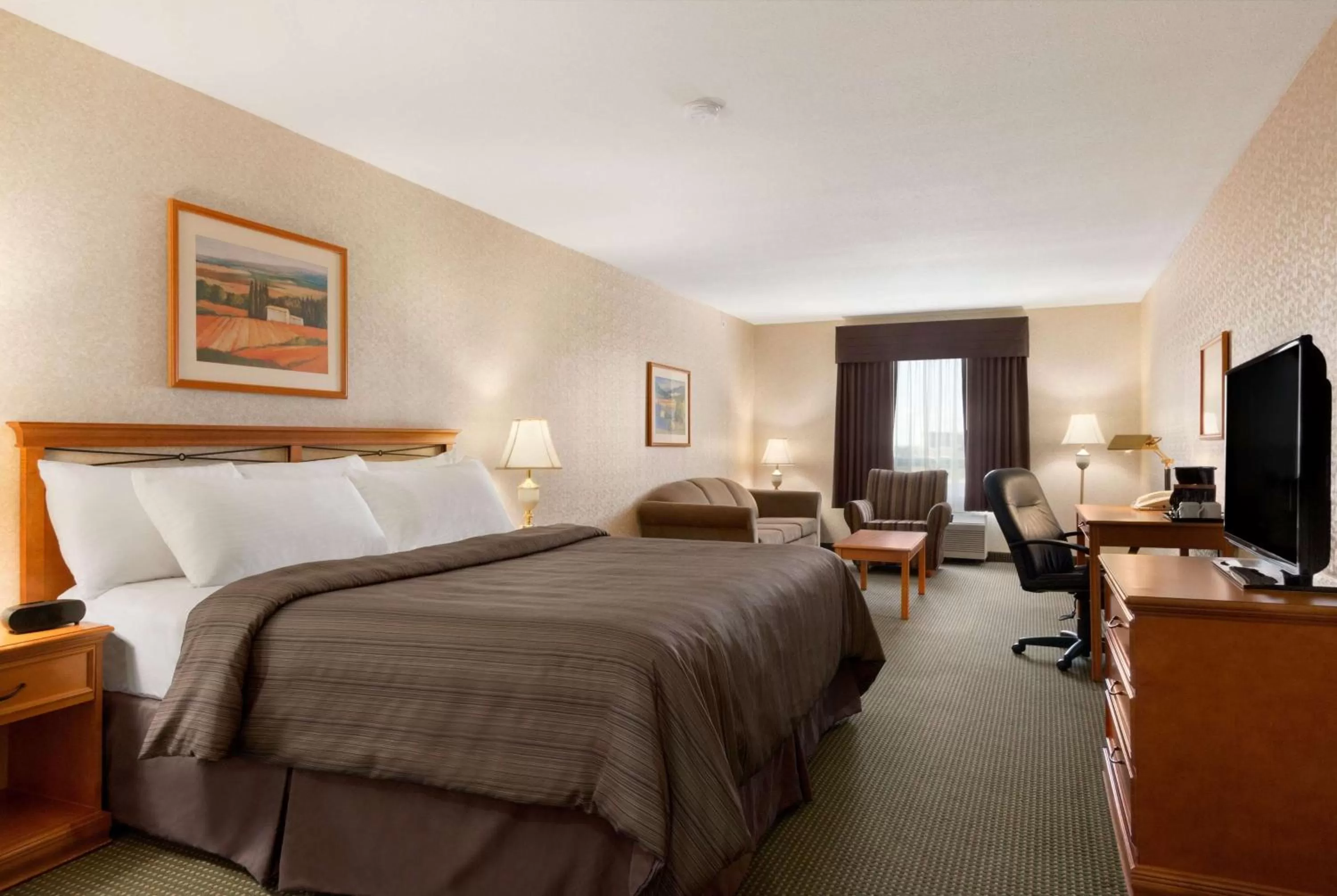 Photo of the whole room, Bed in Days Inn by Wyndham Saskatoon