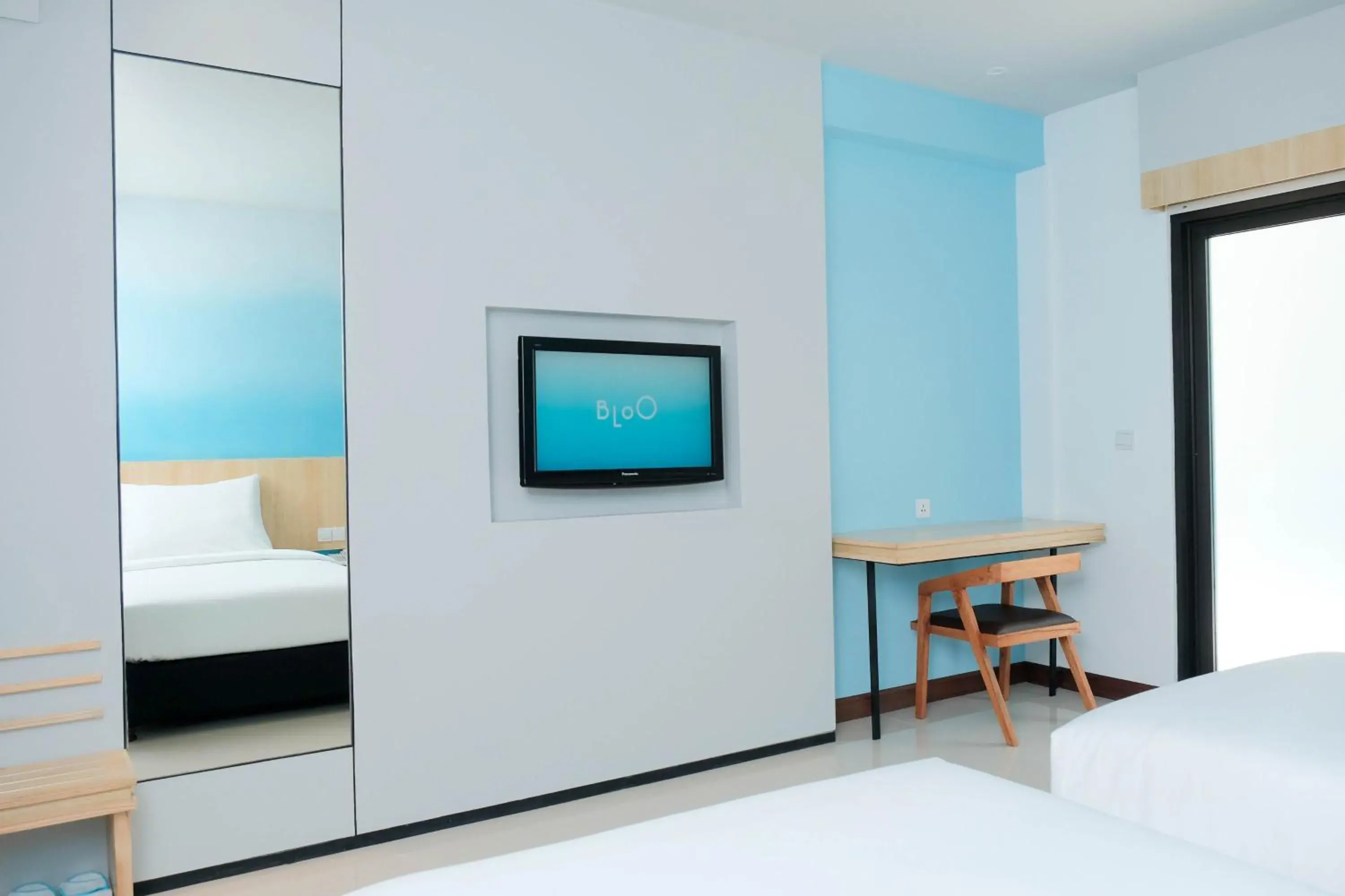 Bedroom, TV/Entertainment Center in Bloo Bali Hotel