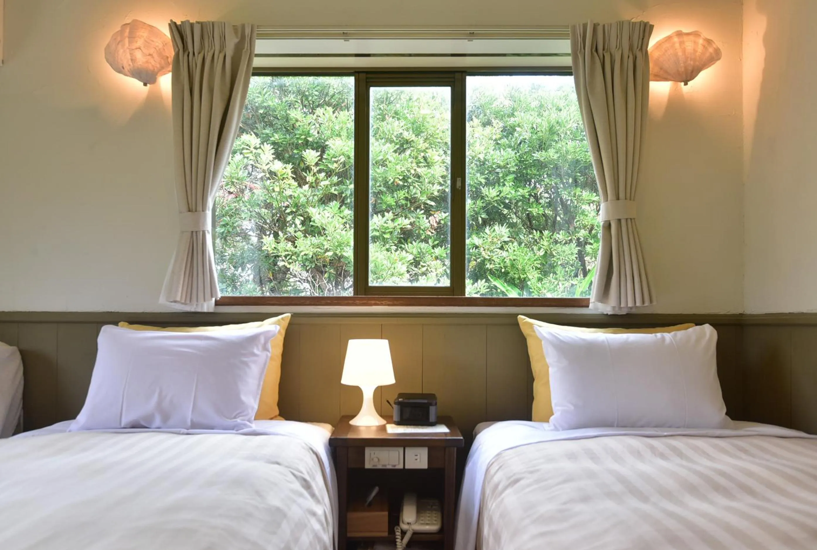 Bed in Gardenvilla Shirahama